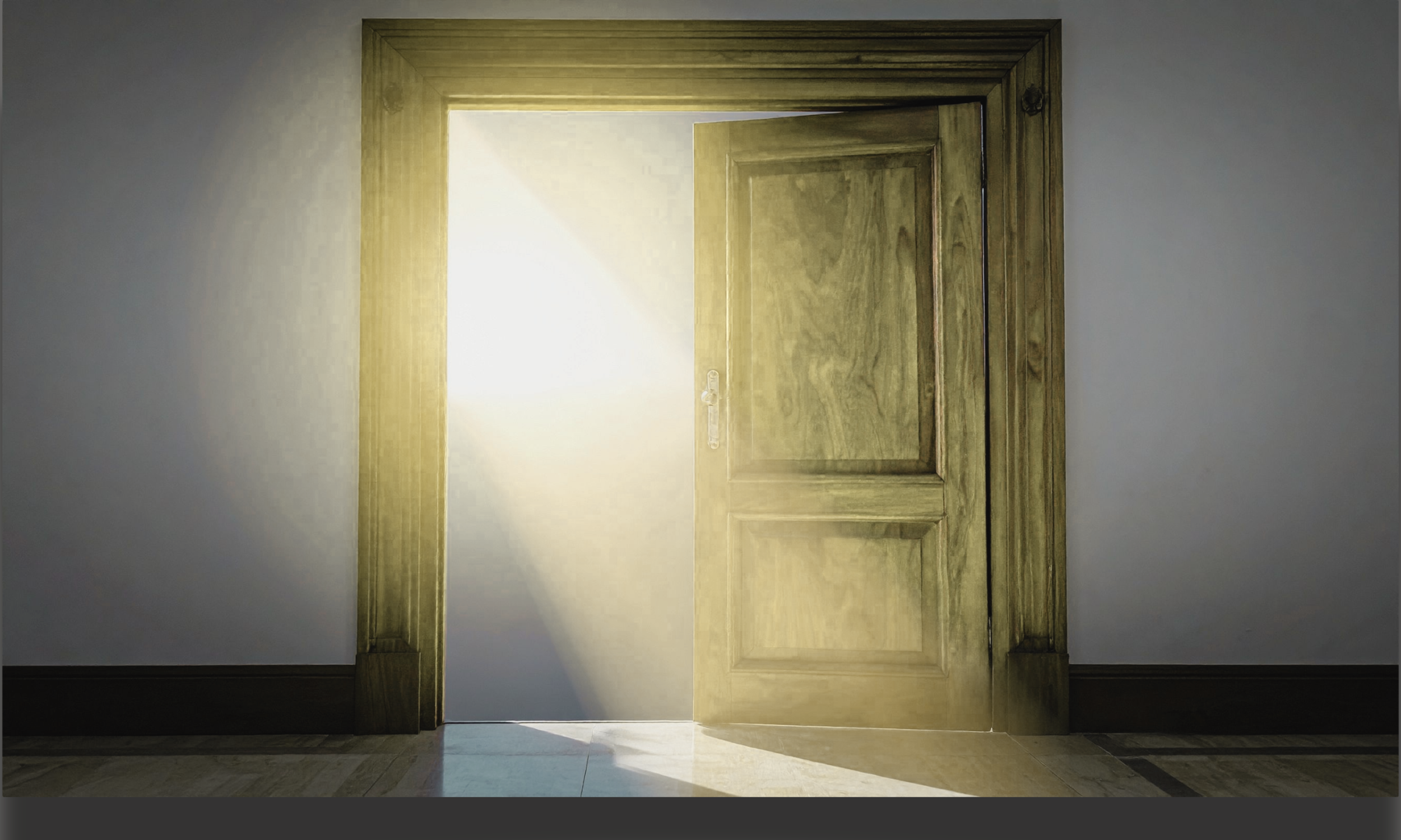 Open doorway with sunlight streaming through.