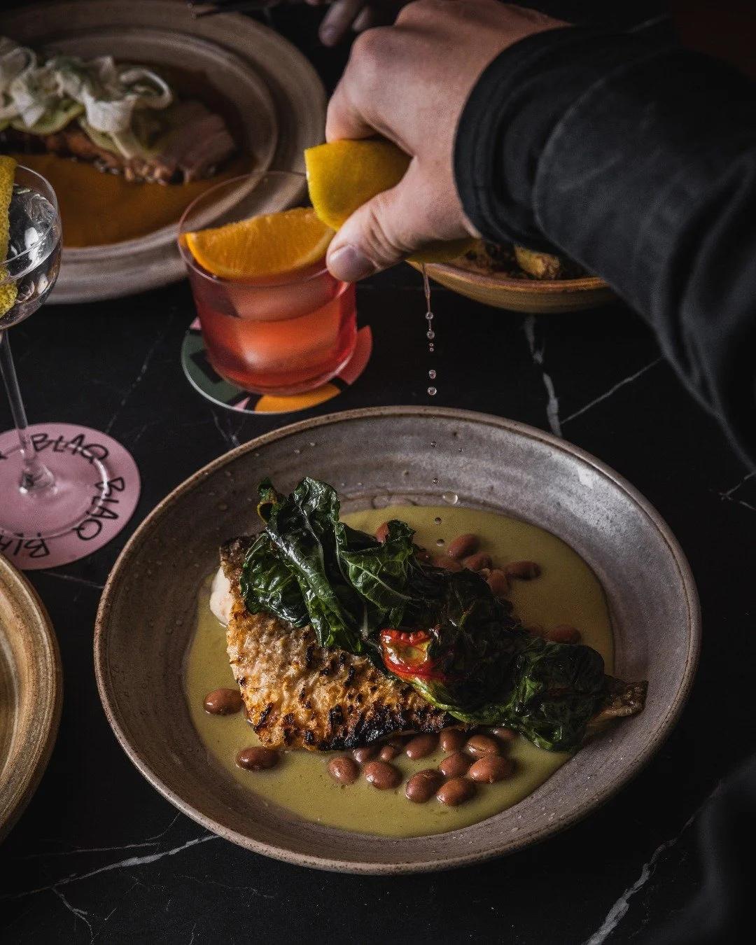 Housed within Kyah boutique hotel at Blackheath, Blaq is a destination in its own right, offering a slice of high-design sophistication, and a playful 70s-glam aesthetic. It&rsquo;s vibrant, polished, and effortlessly chic.

Read more - https://www.t