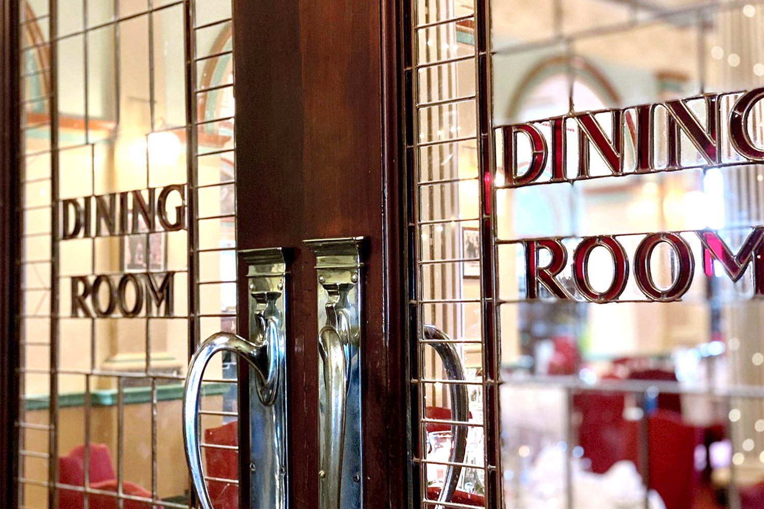 Details of the doors to the grand dining room at the Carrington Hotel
