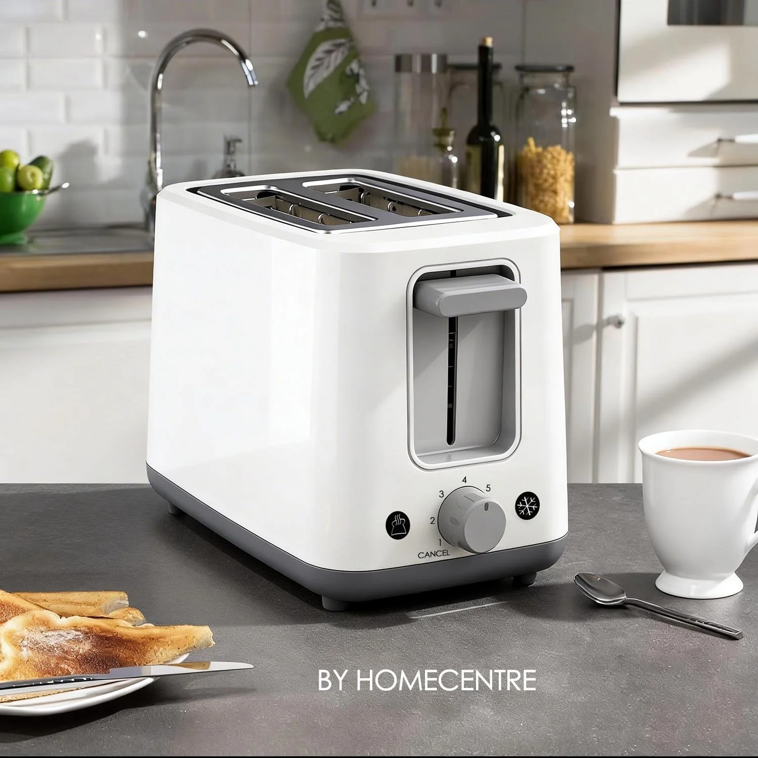 White toaster with four slots and control knob on a kitchen countertop, with a cup of tea, a spoon, and a plate of bread in the foreground, and kitchen sink, jars, and cabinets in the background.
