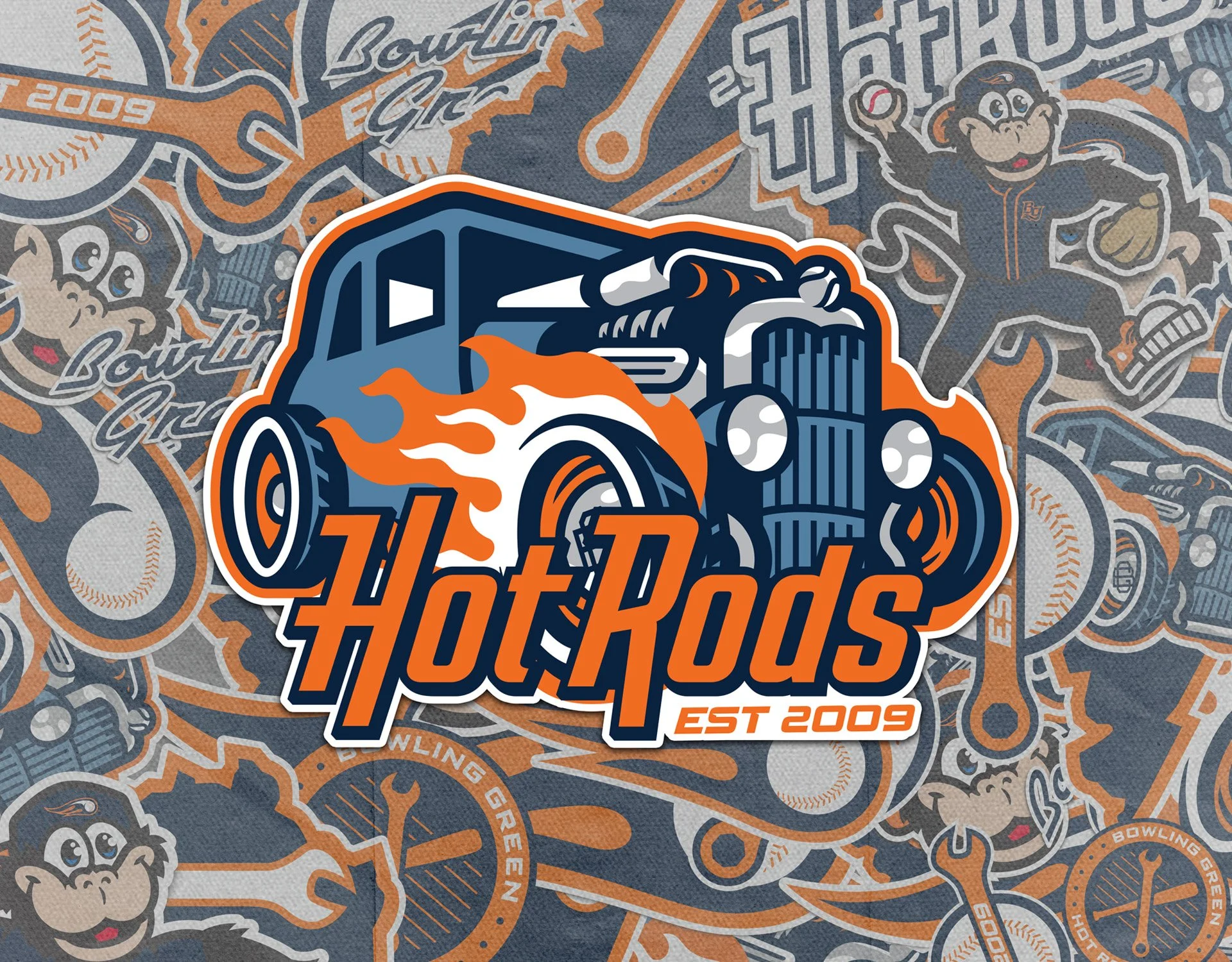 Logo for Hot Rods with a cartoon hot rod car emitting flames, a kid character wearing a baseball cap, and racing elements in the background. The text reads 'Hot Rods EST 2009'.