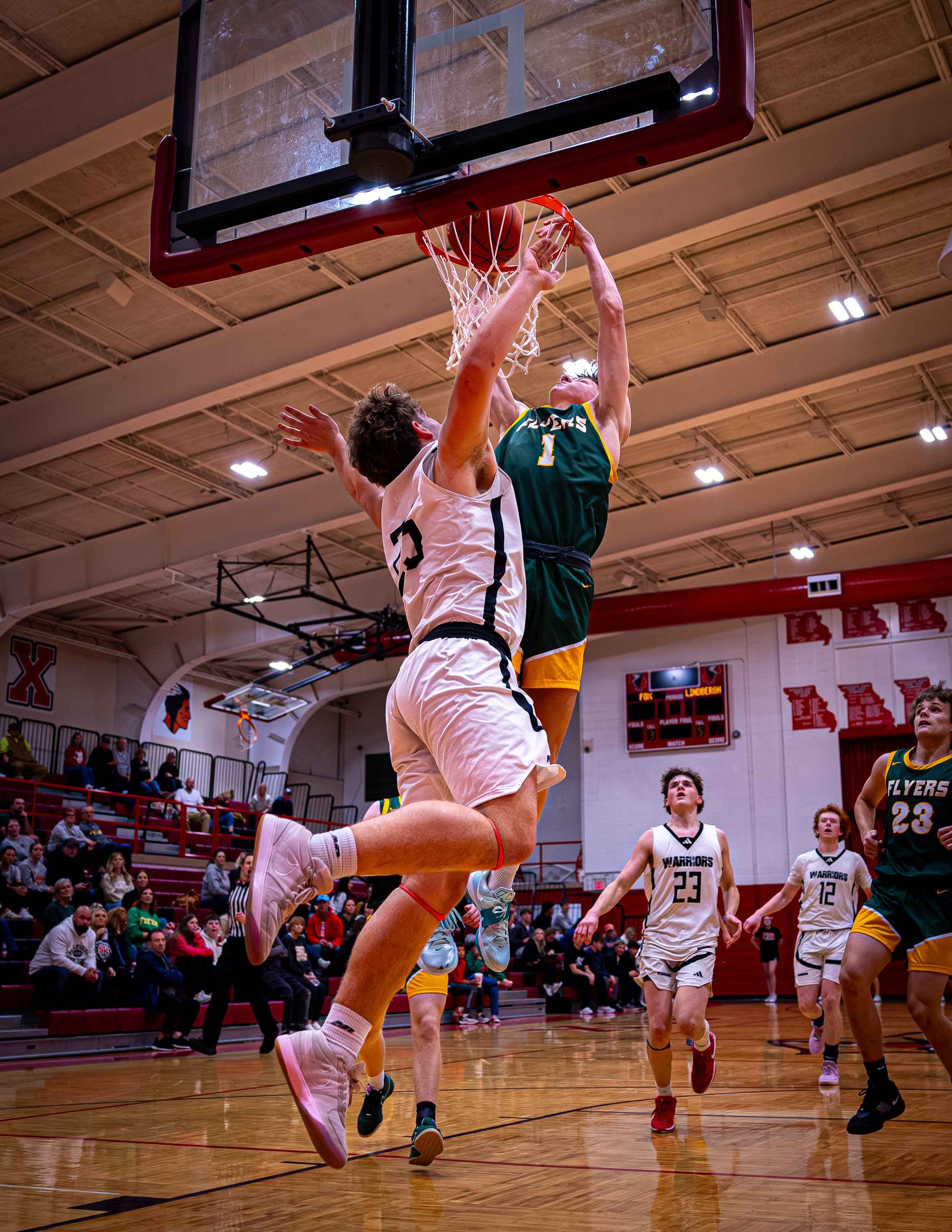 High school basketball photography St. Louis. Browse free high school sports photography galleries from DiscoApe Creative in St. Louis. Football, basketball, wrestling, soccer, cross country, track & field, and pro sports coverage. Sports Photograph