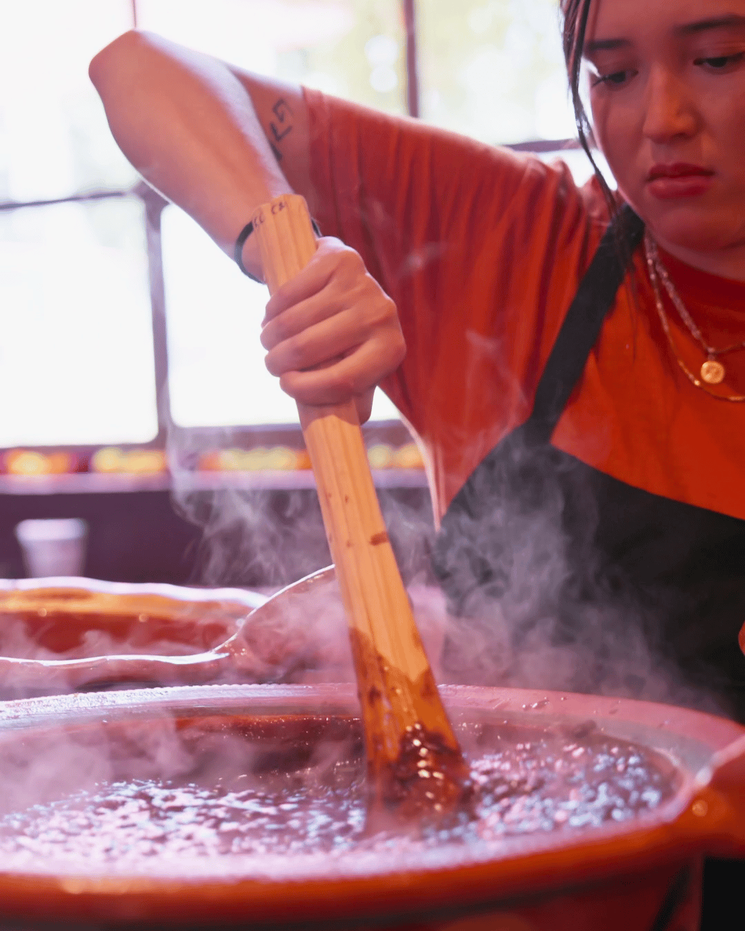 Hot stew being stirred at the Sunday Mexican brunch buffet at Amasa Mexican Kitchen