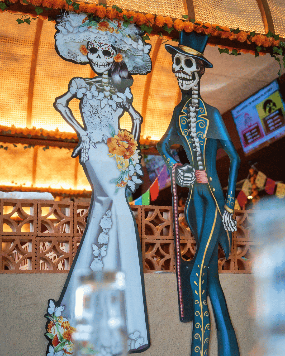 Day of the Dead Catrina bride and groom figures at Amasa Mexican Kitchen