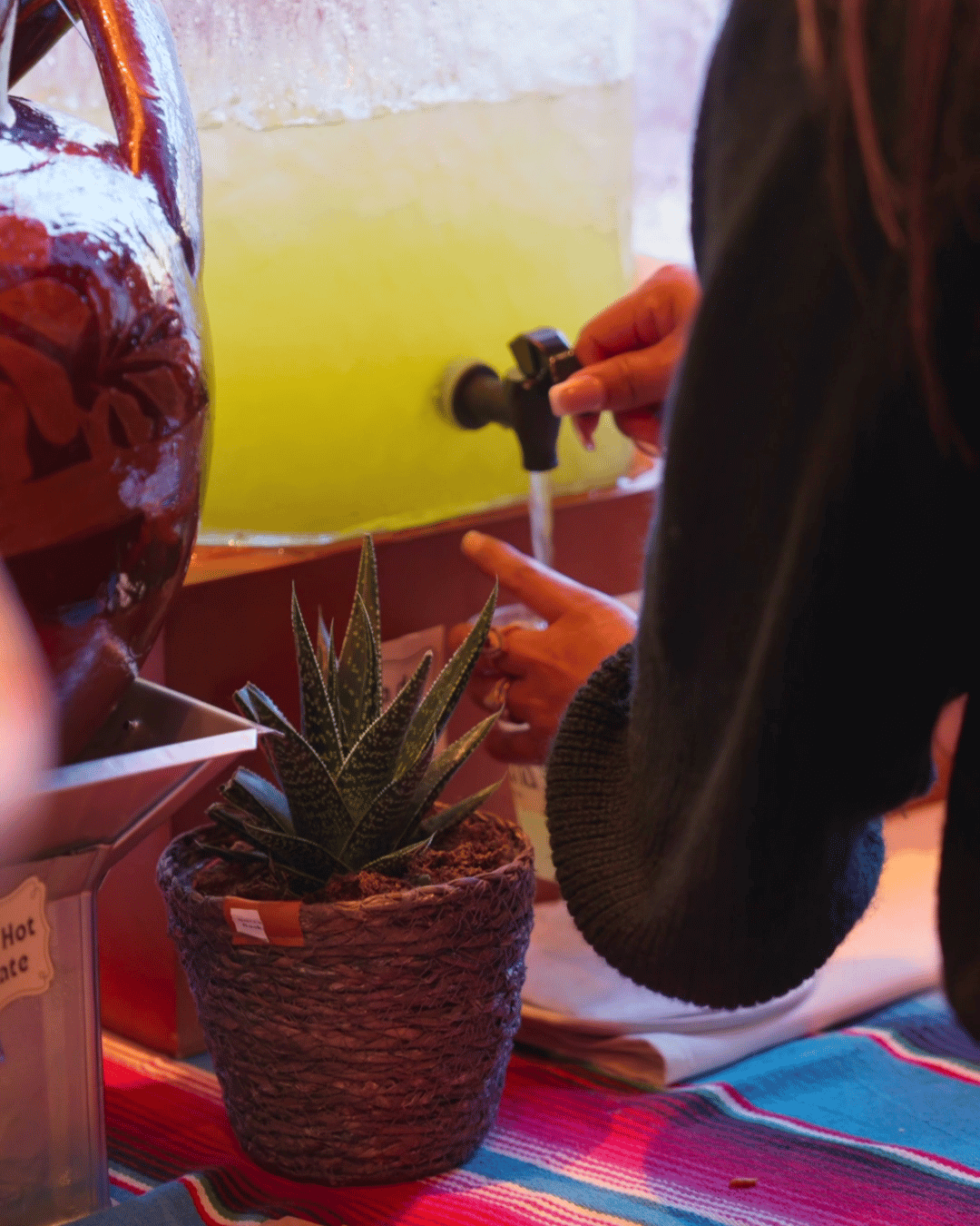 Agua fresca dispenser at the Sunday Mexican brunch buffet at Amasa Mexican Kitchen