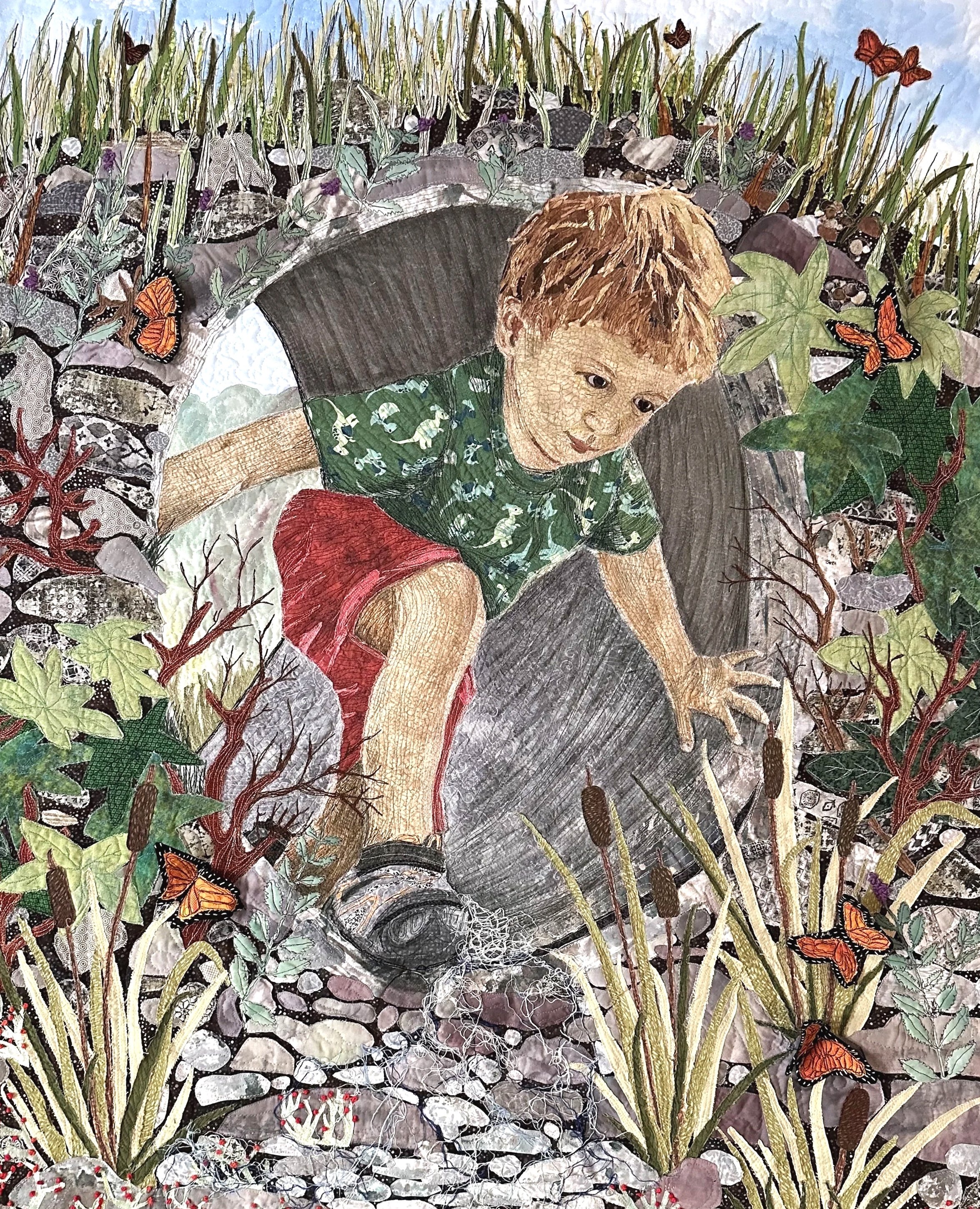 A child crouching near a rocky creek, surrounded by grass, flowers, and butterflies.