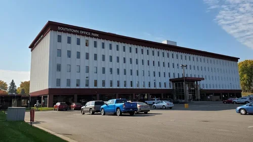 Southtown Office Park building with parking lot in front