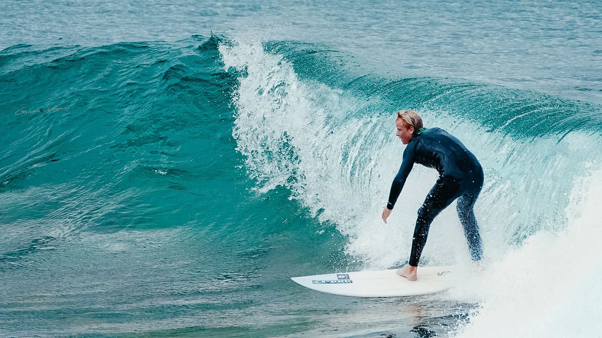 A person surfing on a wave