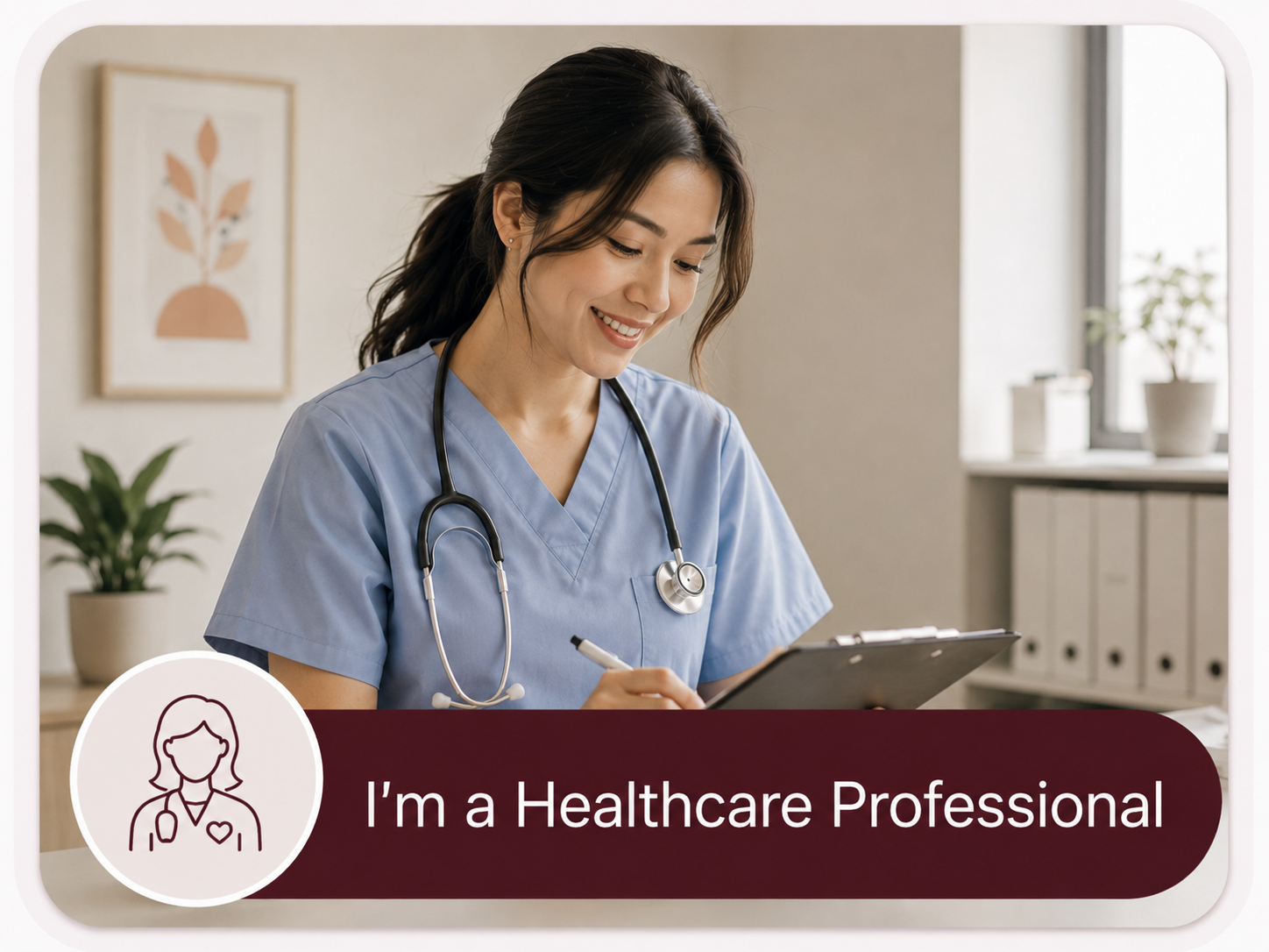 A smiling female healthcare professional in scrubs with a stethoscope around her neck, writing on a clipboard in a bright clinical setting.