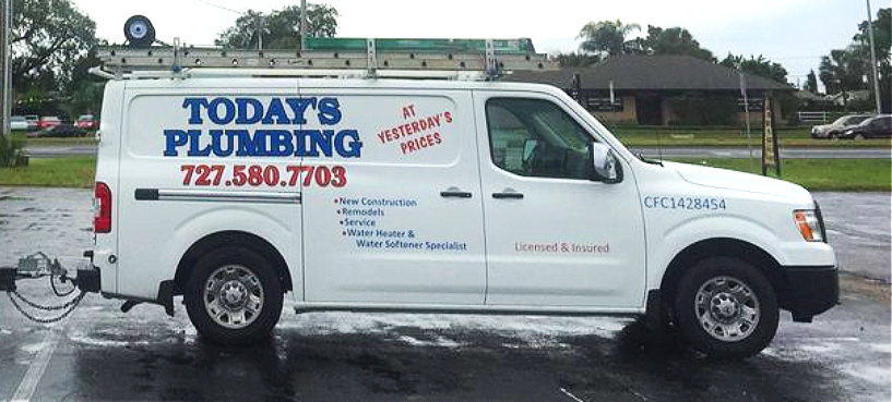 White painting and plumbing service van with contact info and services listed.