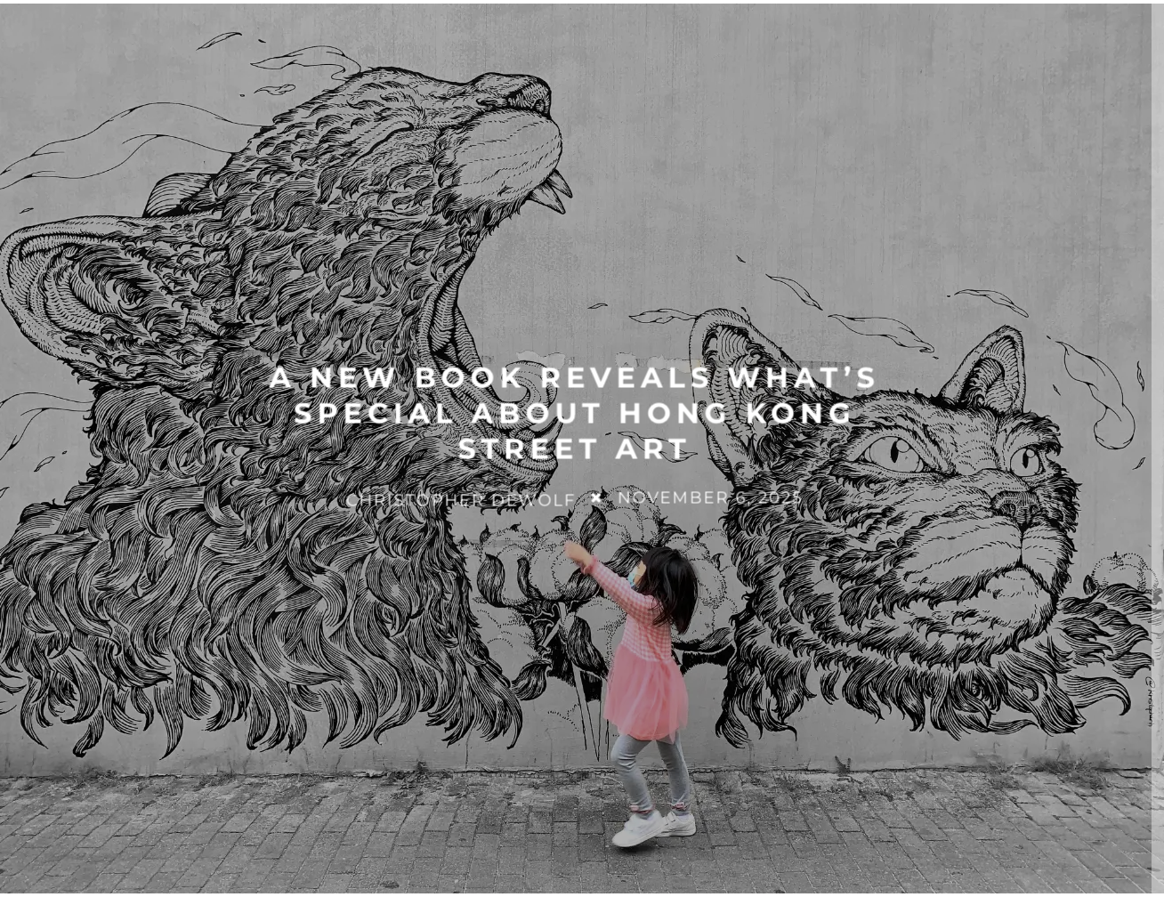 Girl in pink dress standing in front of street art mural of two lions on a wall, with text overlay about a new book on Hong Kong street art.
