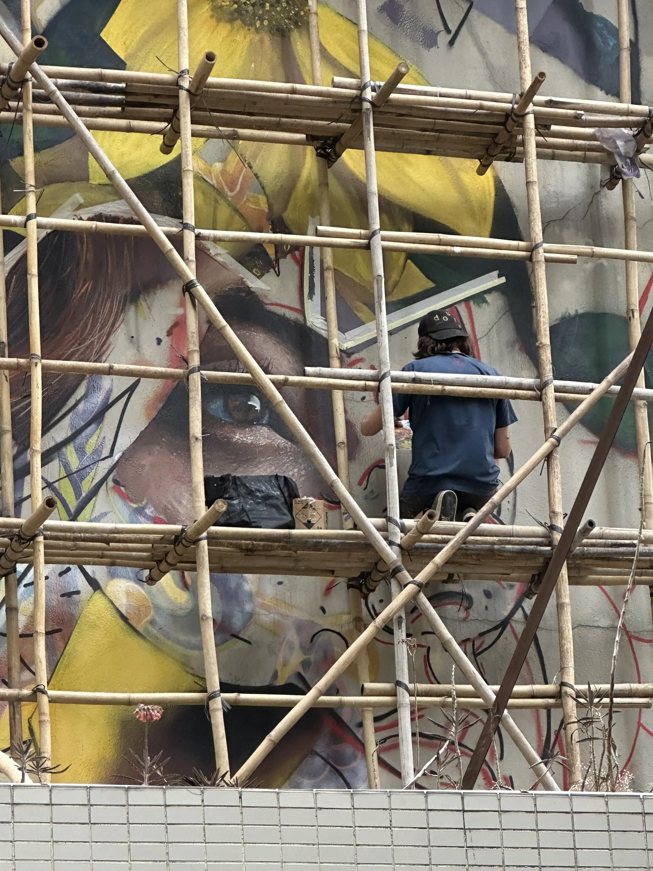 Work in Progress, French artist Kogaone working on his mural for HKwalls 2023