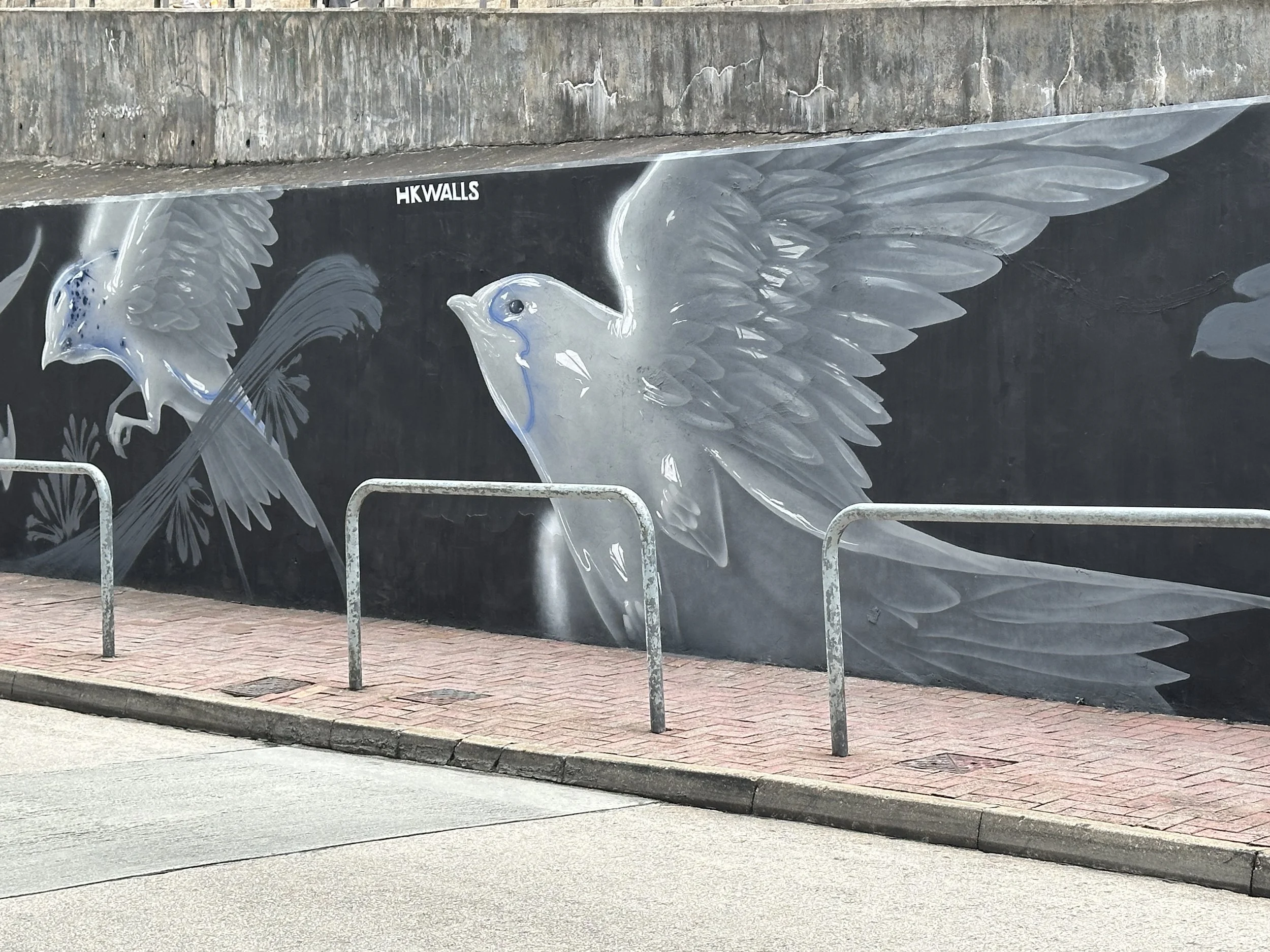 Detail of Chinese artist's Nut's mural 'Welcome Home' for HKwalls 2025