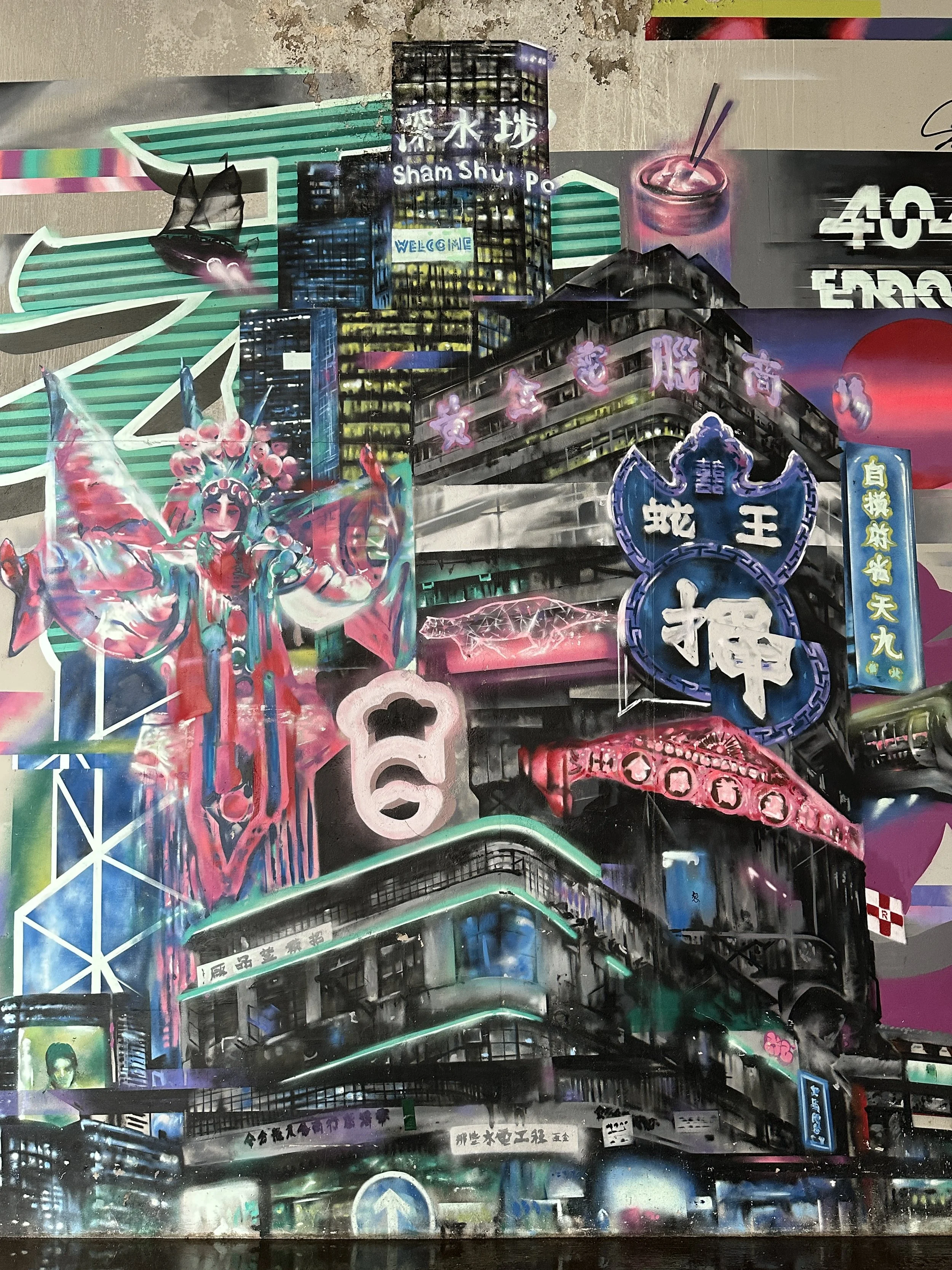 A vibrant, colorful neon-lit cityscape with Asian-inspired signage and architecture, including a large animated figure wearing traditional robes and a headdress, skyscrapers, and various illuminated neon signs in Chinese characters and English, depicting a lively urban scene at night.