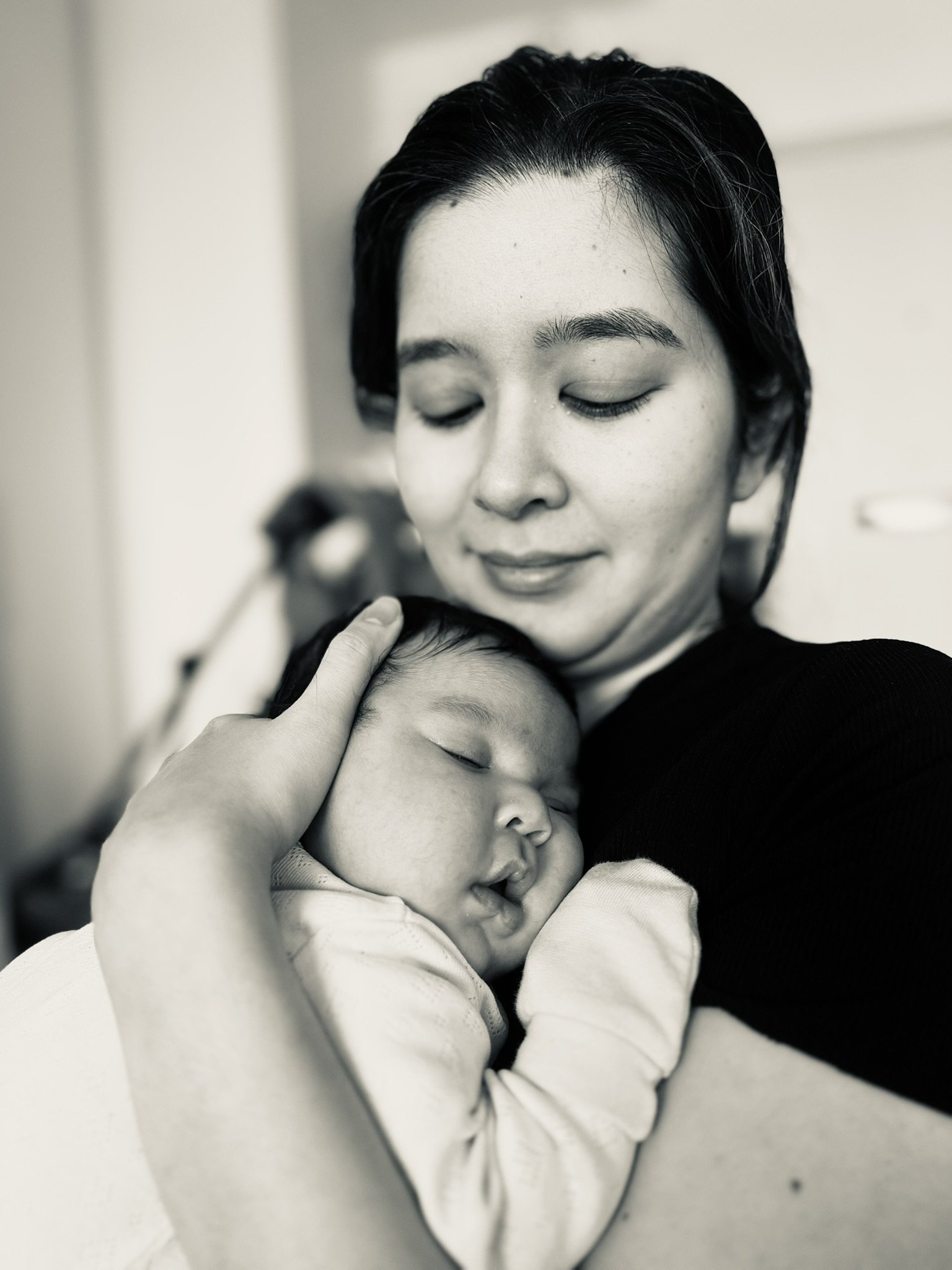 A mum doing a great job nurturing her new baby