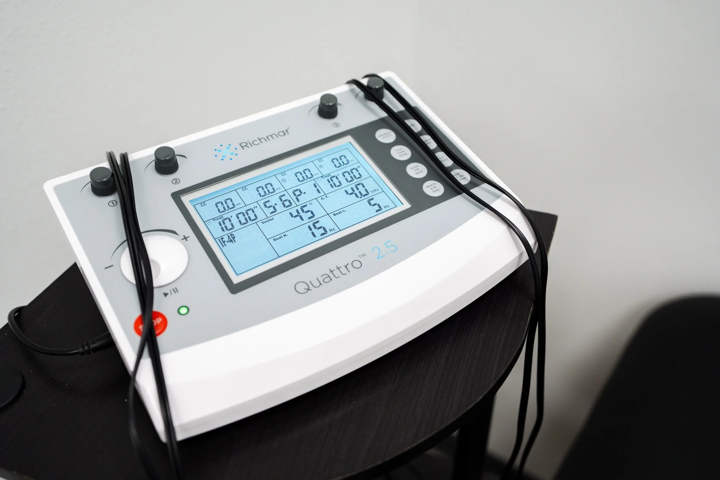 White outline of a medicine bottle with a cross symbol on it, set against a black background.