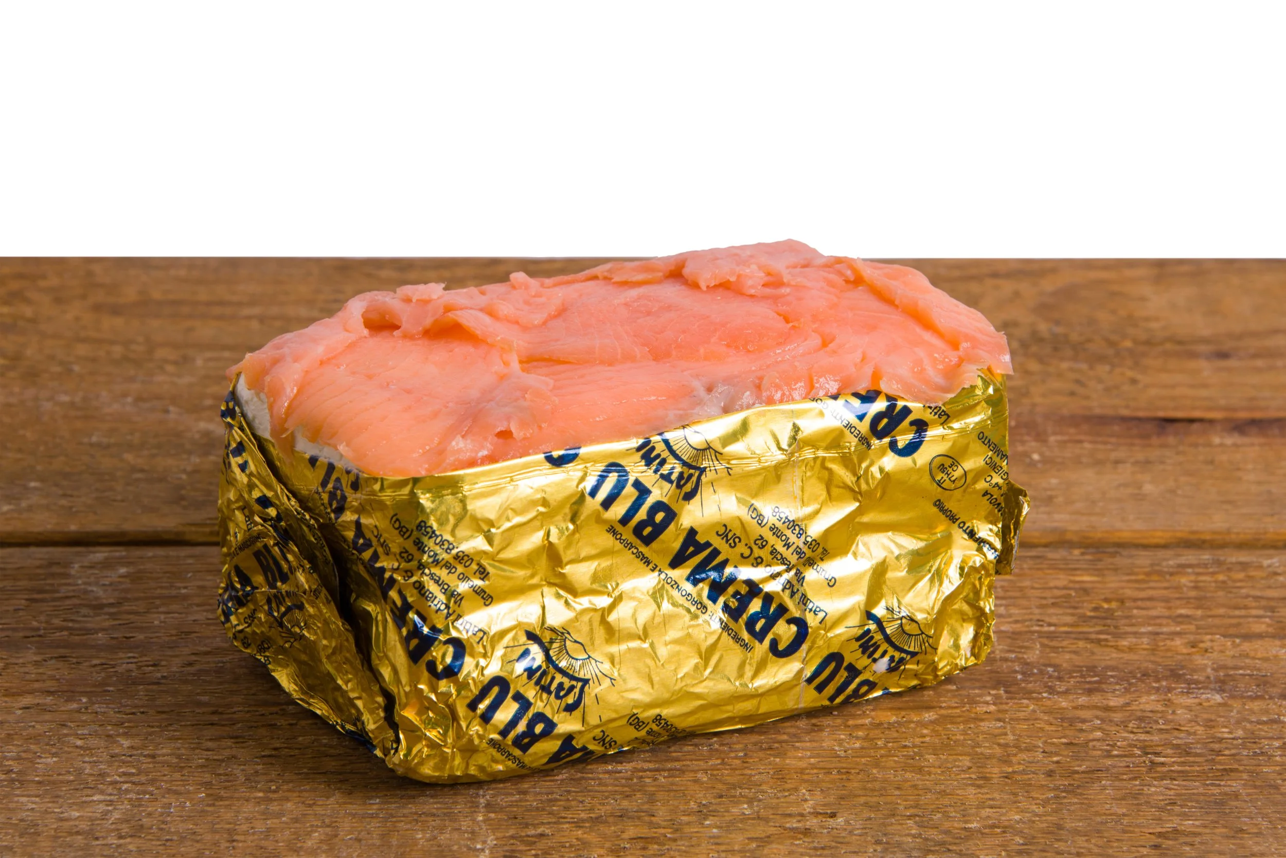 A square cake made of gorgonzola, mascarpone and salmon