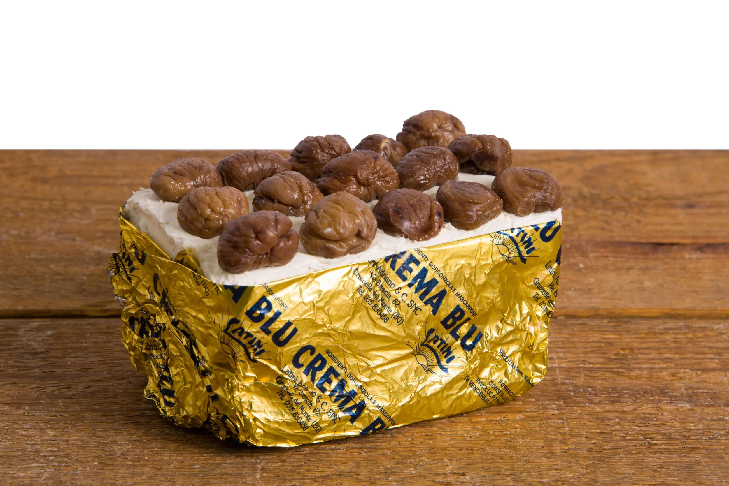 A square cake made of gorgonzola, mascarpone and chestnuts