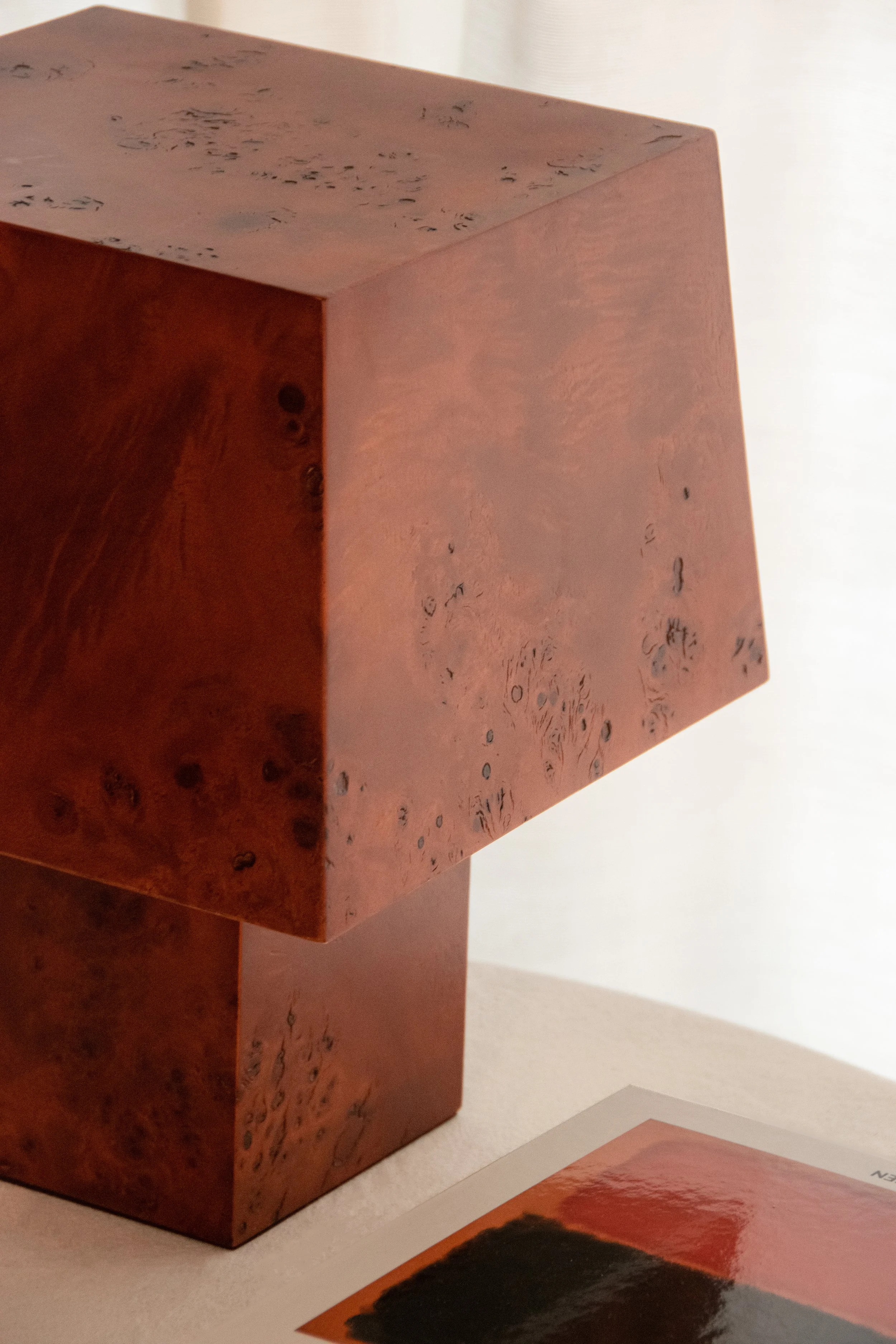 Close-up detail of sculptural burl wood table lamp