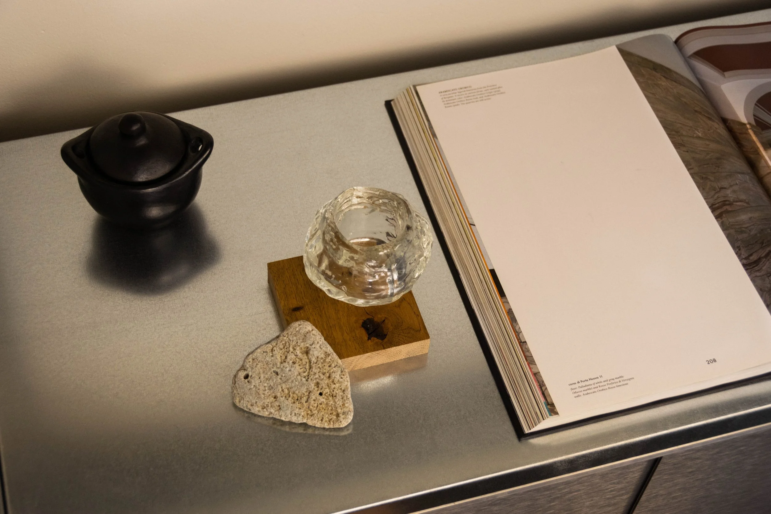 Styling objects in metal cabinet in Reflections Office