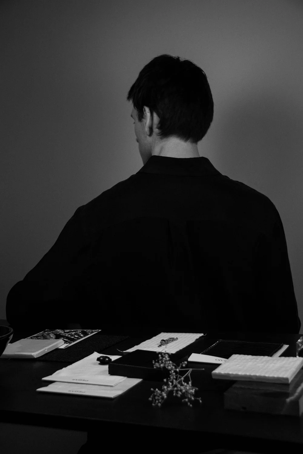 Joost Laméris, founder of Studio Cér, turned toward a table of material and textile samples.
