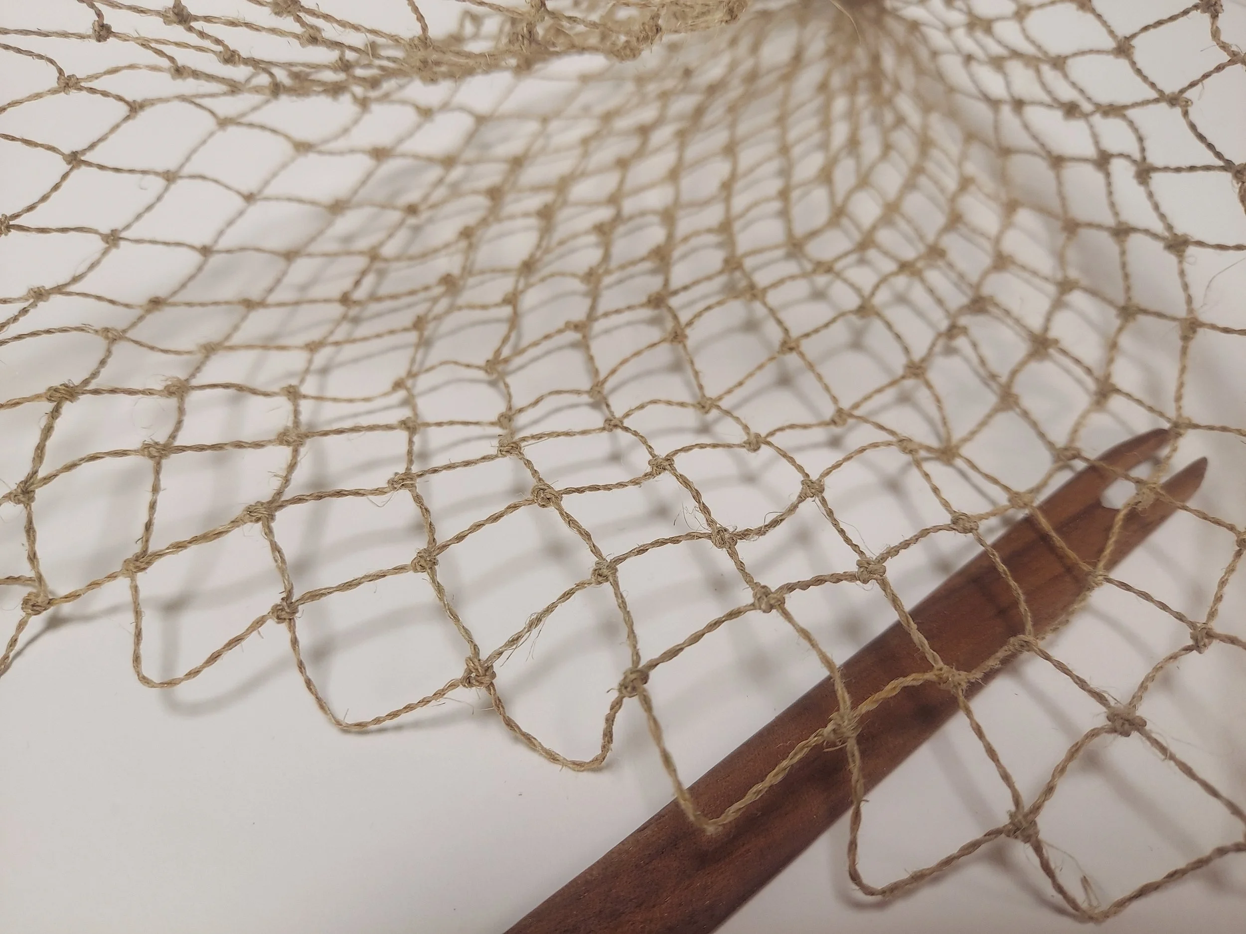 linen net and shuttle