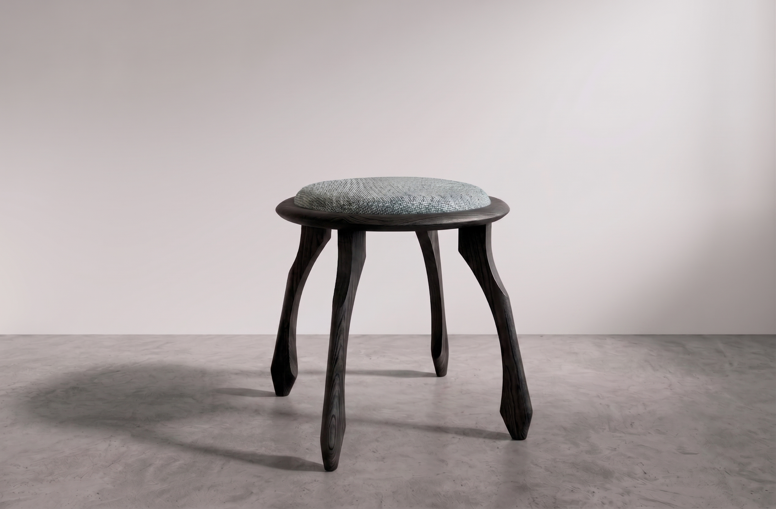 ebonized ash sparrow dining stool with cushion.png