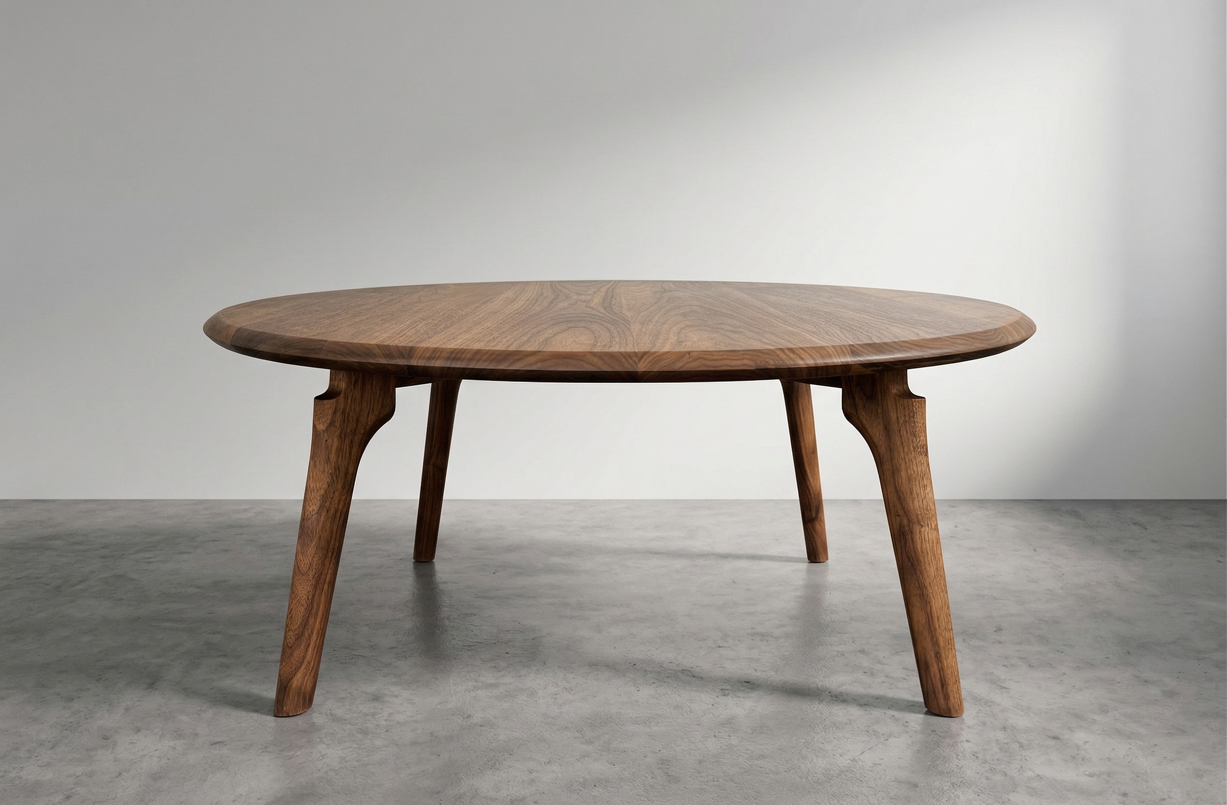 walnut round coffee table.png