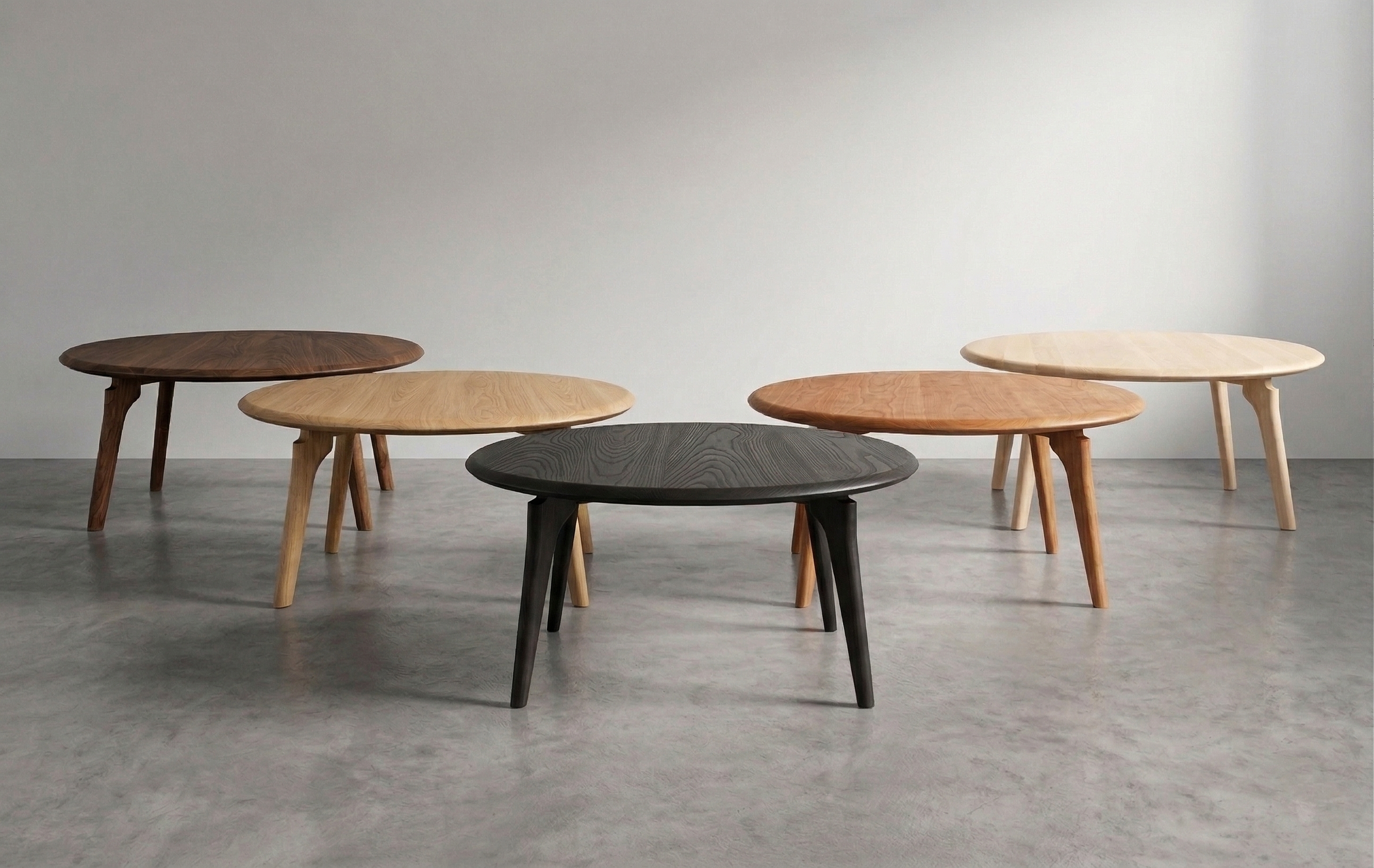 all hardwoods round coffee table.png