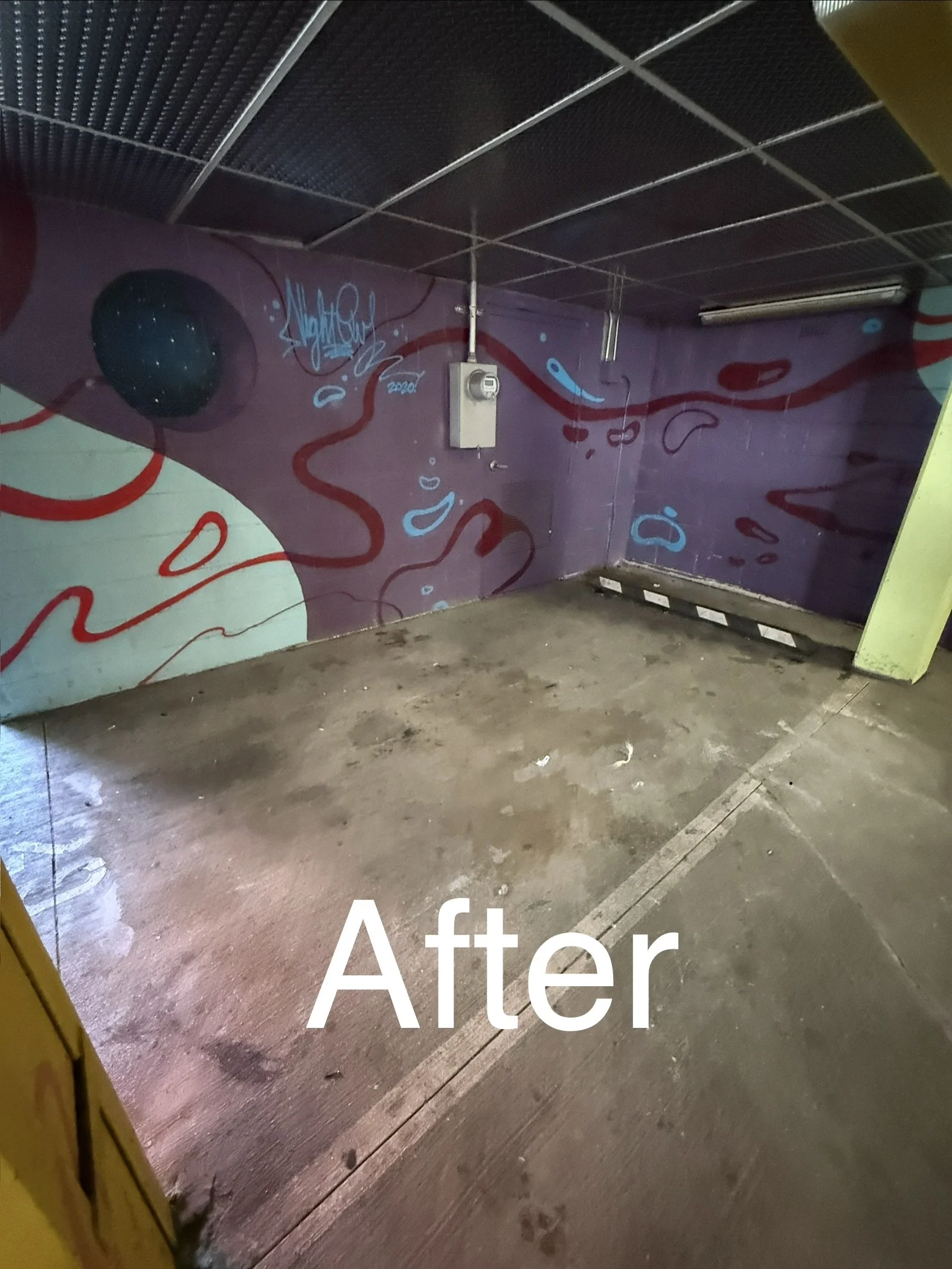 After graffiti removal, a wall with colorful abstract mural art featuring swirling lines and a dark circle resembling a galaxy. The floor is concrete with some dirt and marks, and the word "After" is overlaid on the bottom of the image.