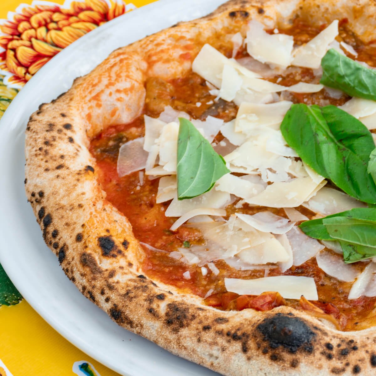 Parmigiana special pizza with eggplant and shaved Parmesan
