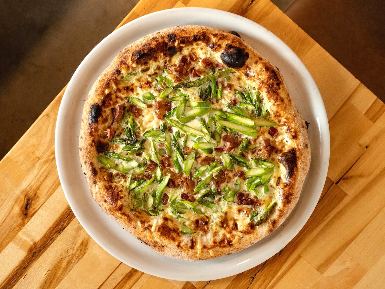 Milanese pizza special with bacon and thinly-sliced roasted artichokes