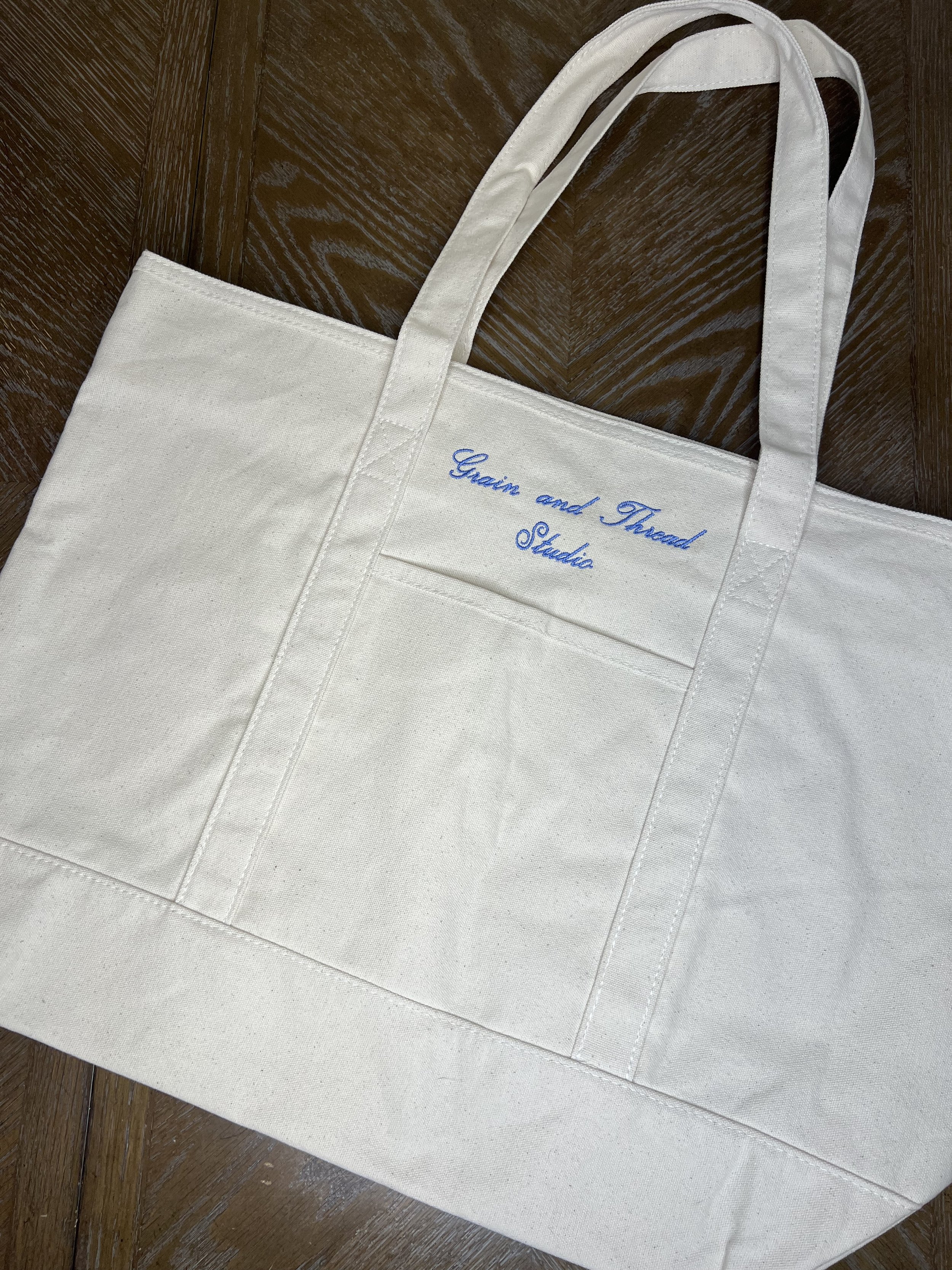 Zipper top canvas tote with personalization