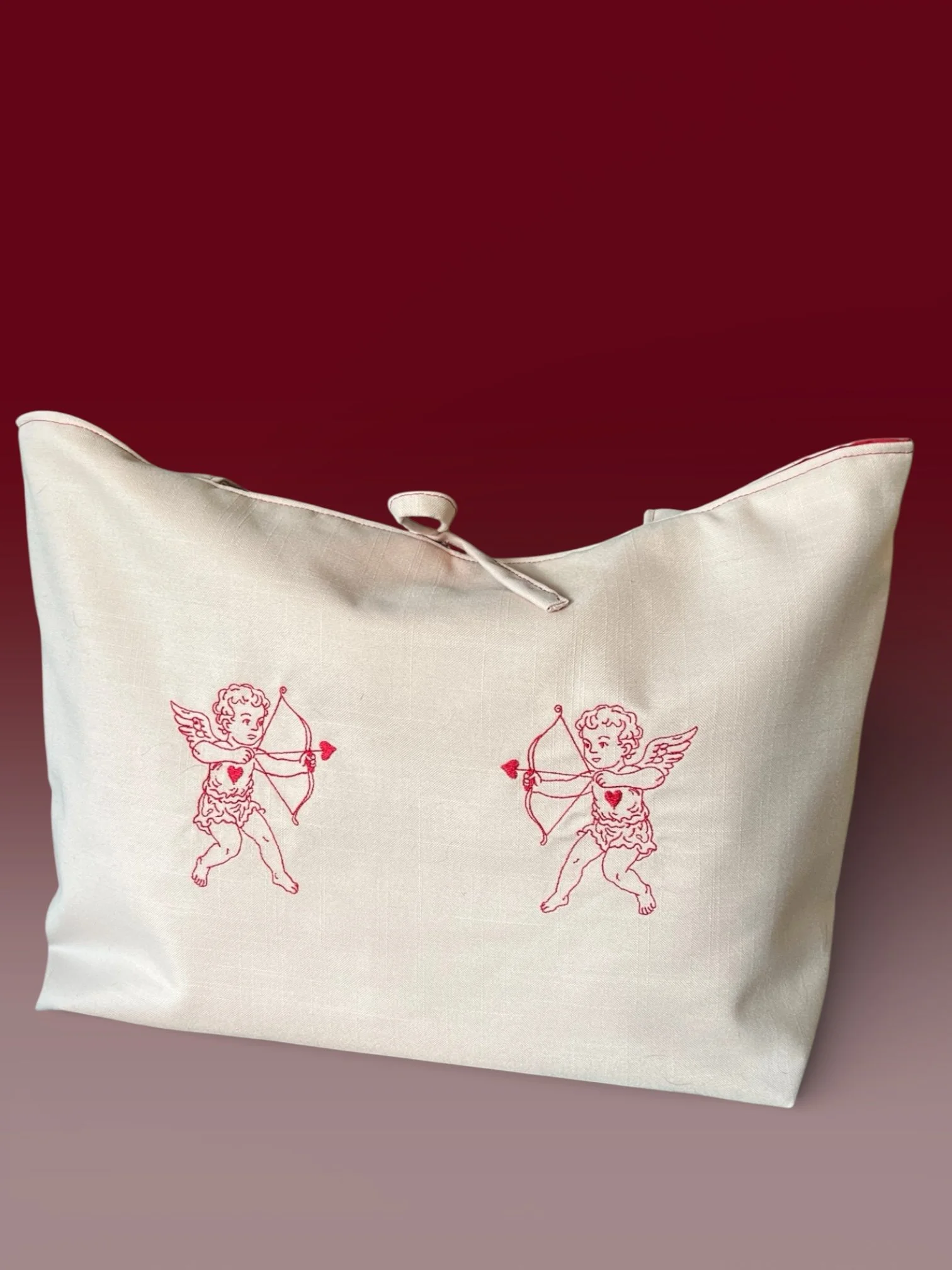 Pink tote with embroidered angels