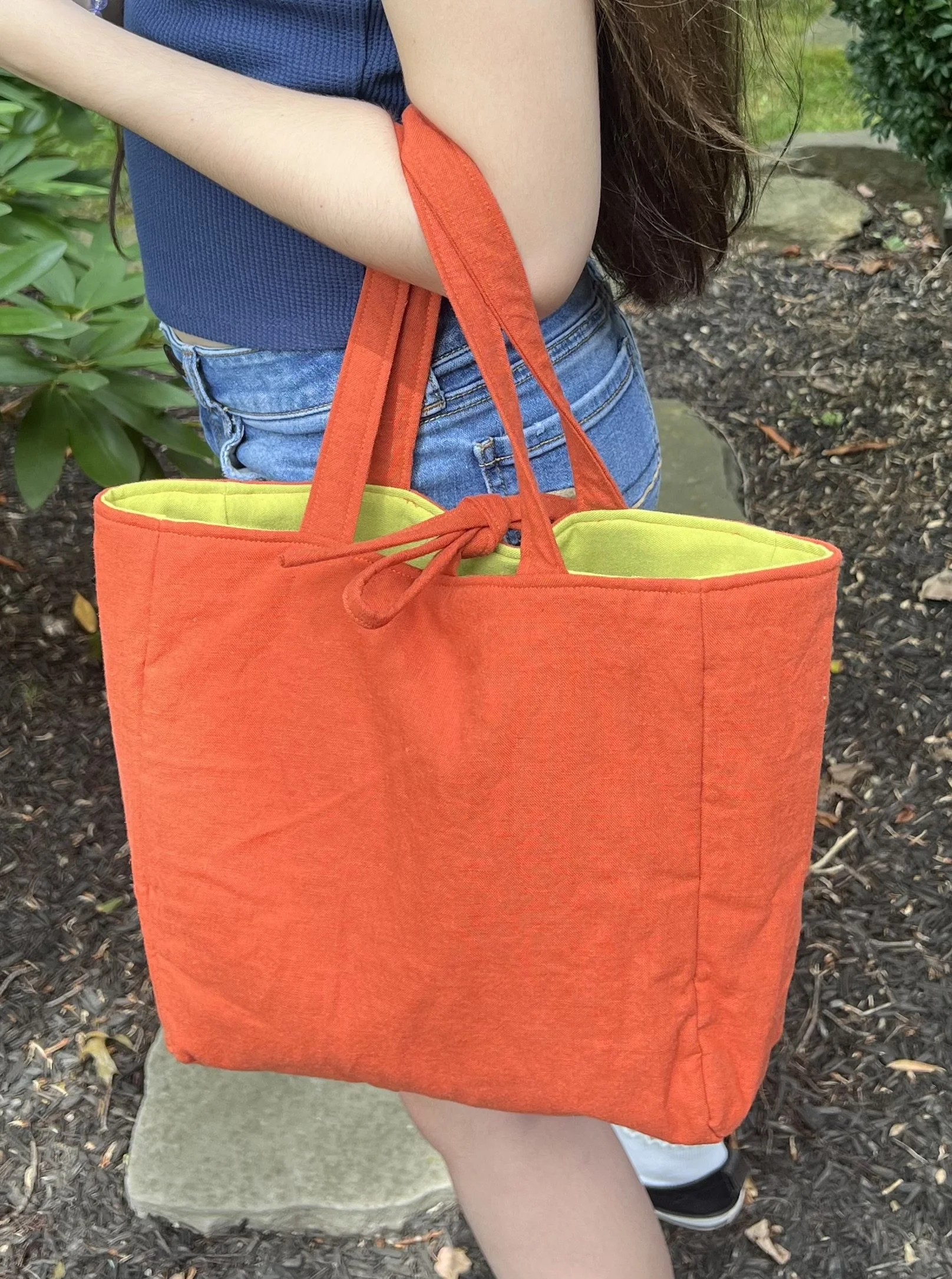 Orange tote with lime green interior