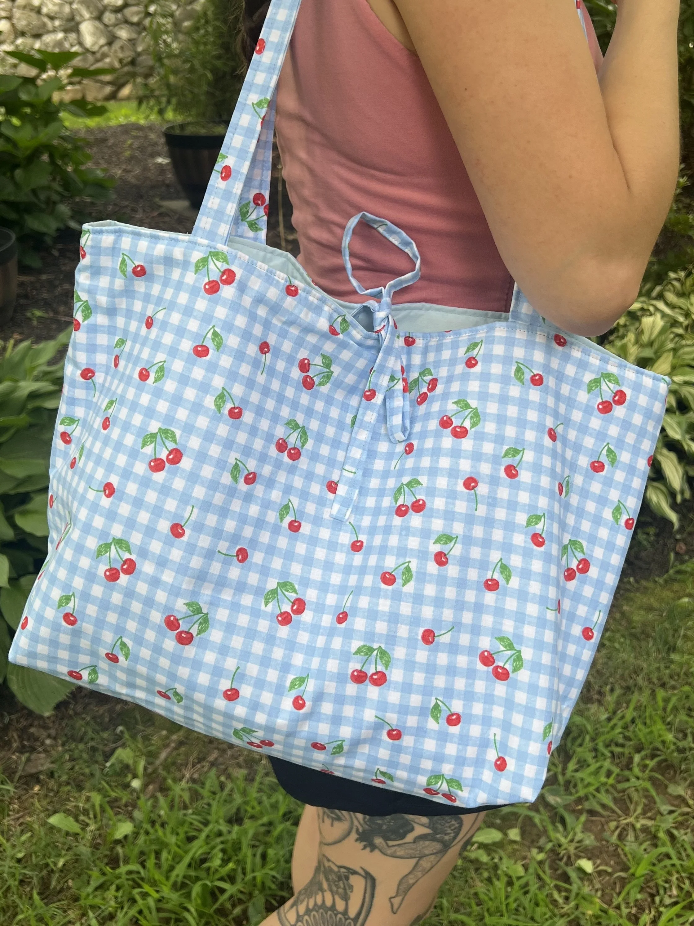 Blue checkered tote with cherries