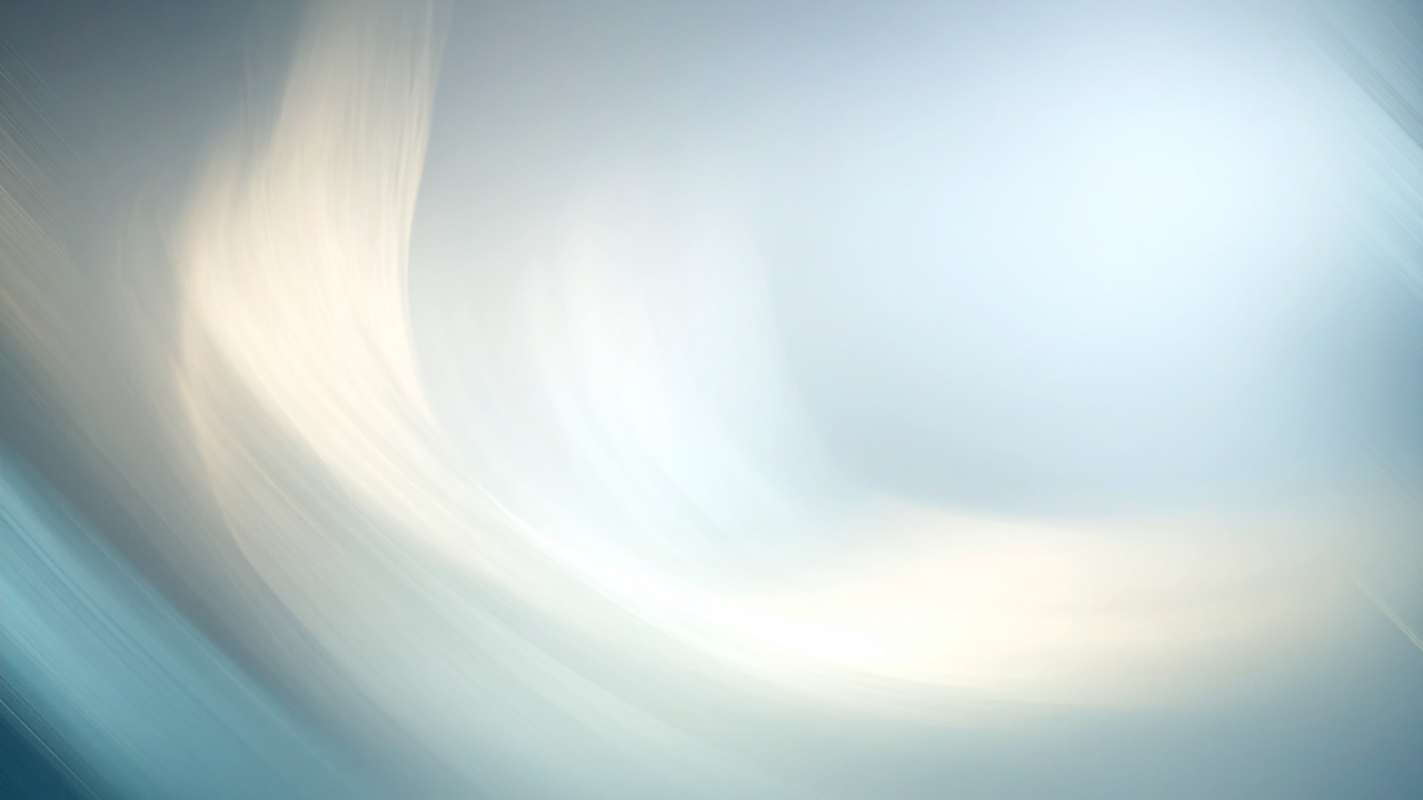 Abstract swirl of light and dark shades of blue, white, and beige.