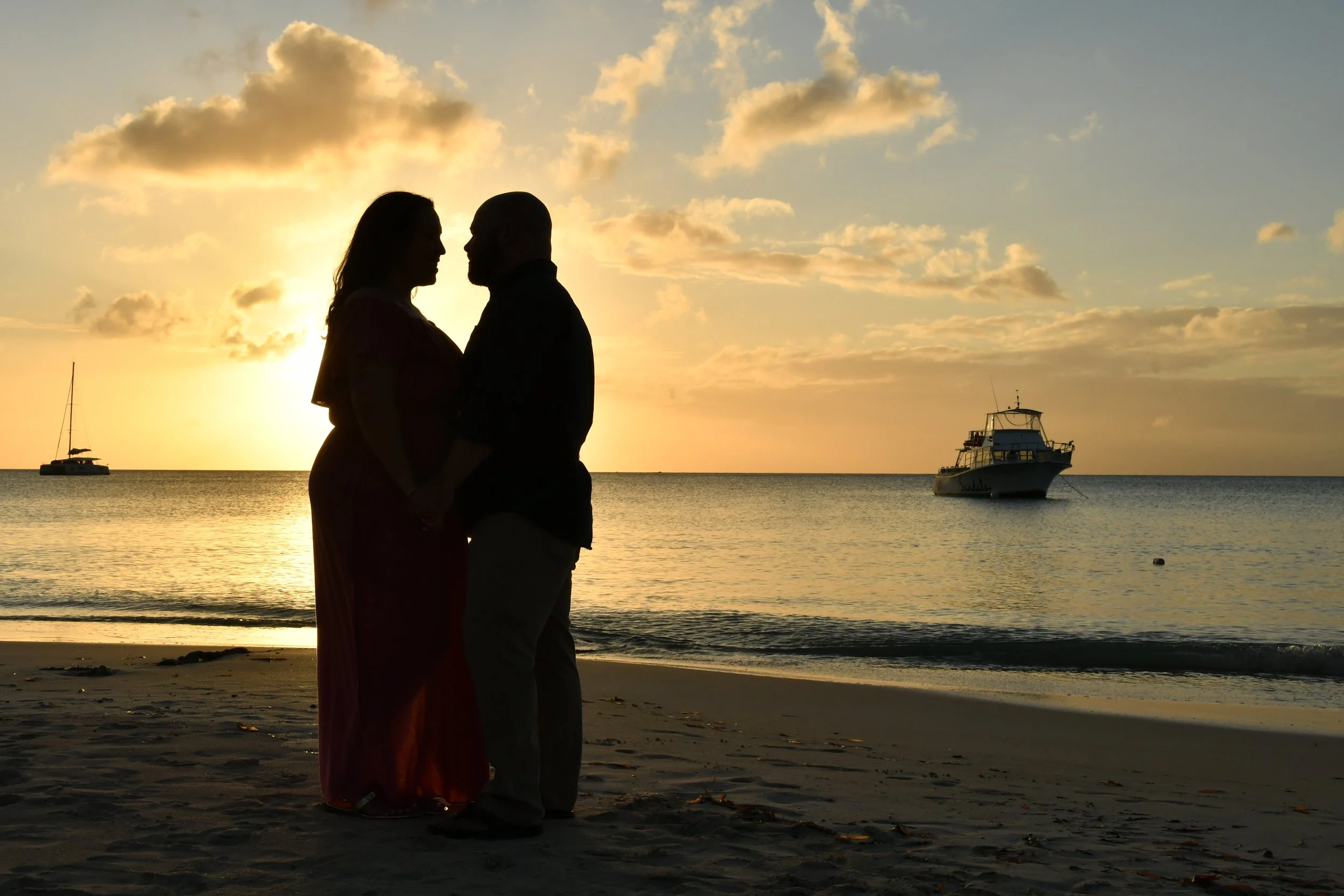 Couple on beach at sunset