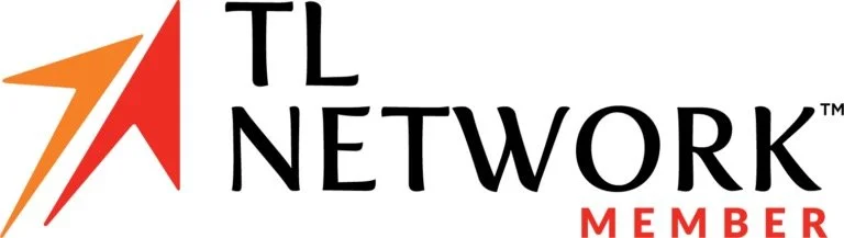 An upward pointing red arrow that is split down the middle, which is the logo for Travel Leaders Network consortium