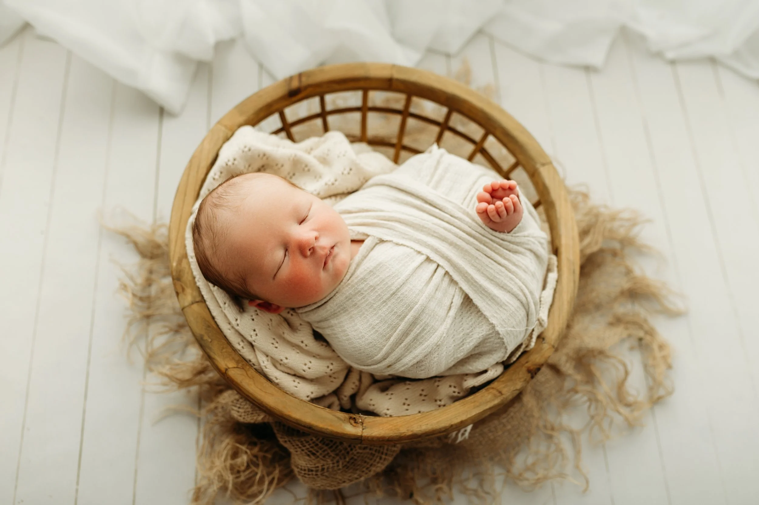 beautiful nashville tennessee baby boy captured organicly and swaddled for his newborn session