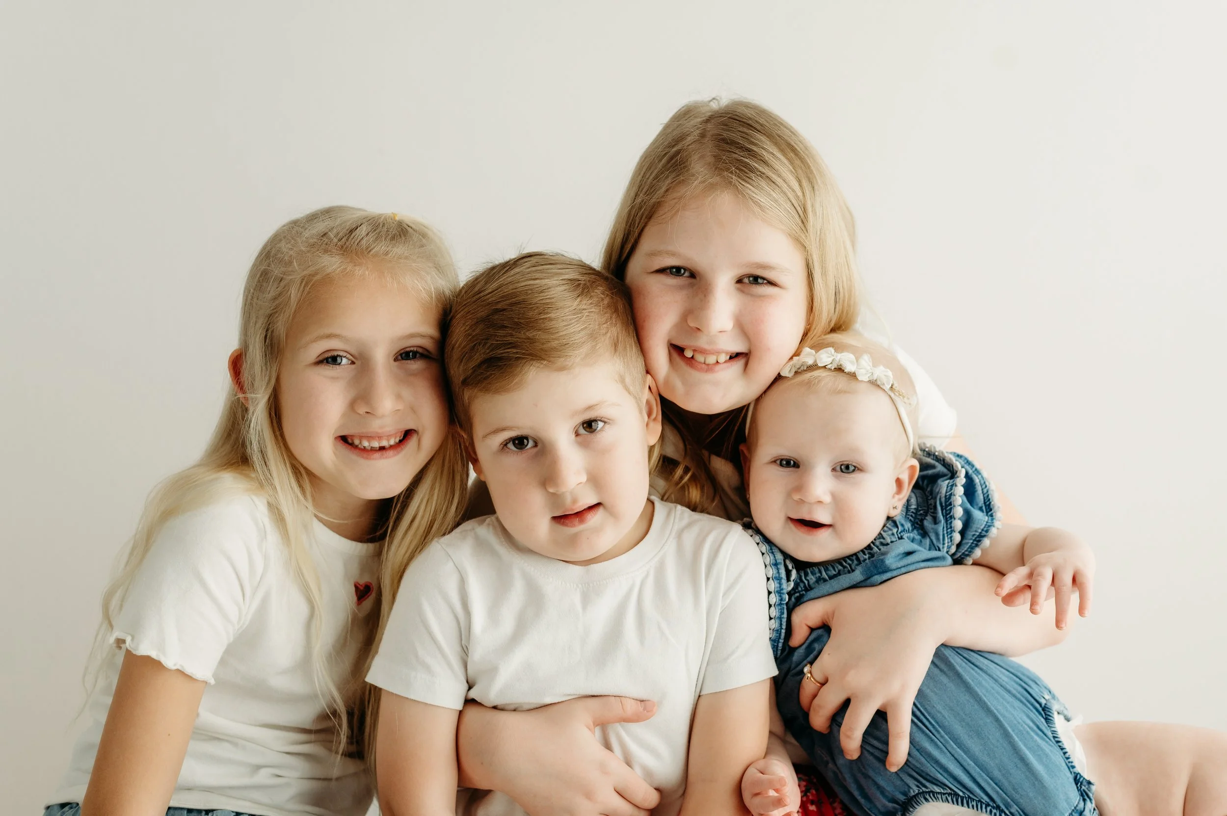 timeless family session in a white studio in Ashland City, TN