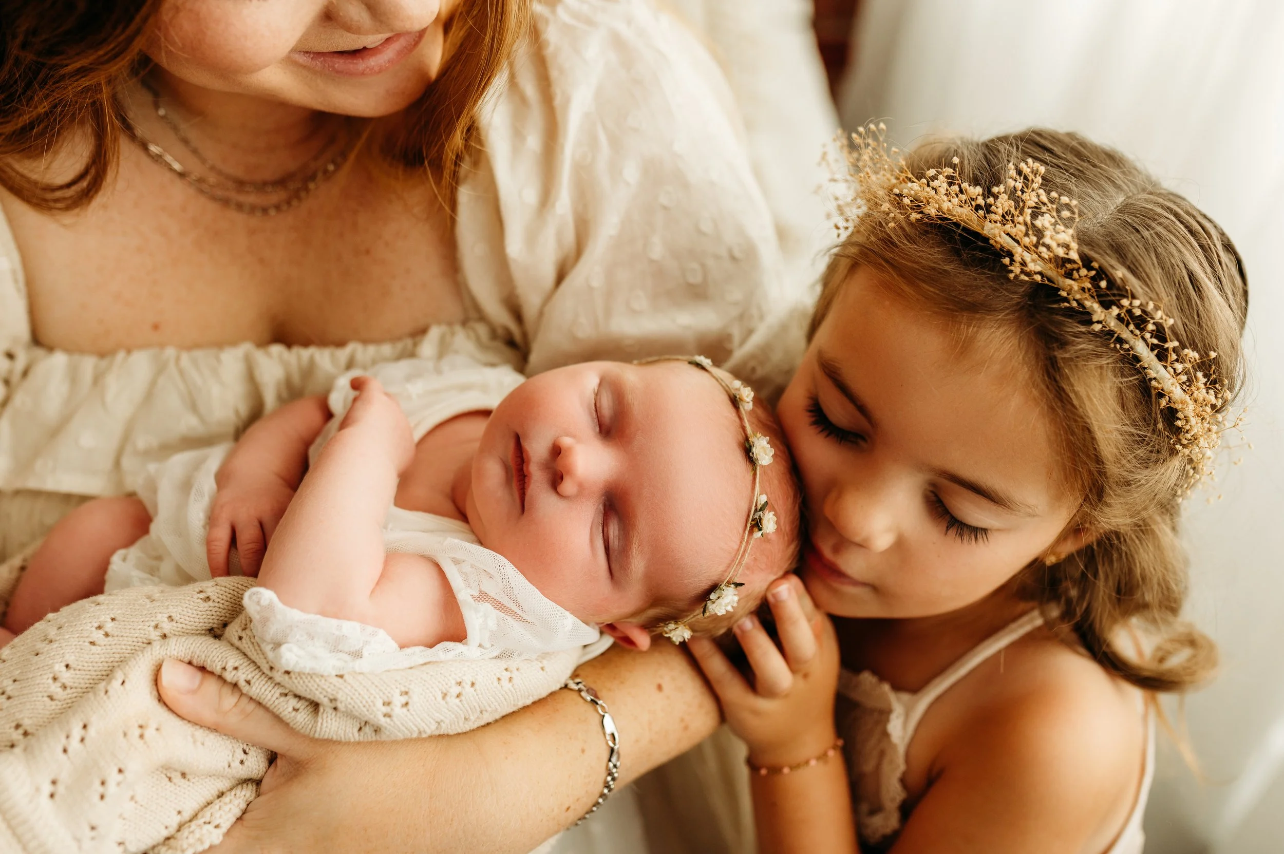 Pleasant View, TN newborn photos of sisters in a timeless lifestyle studio