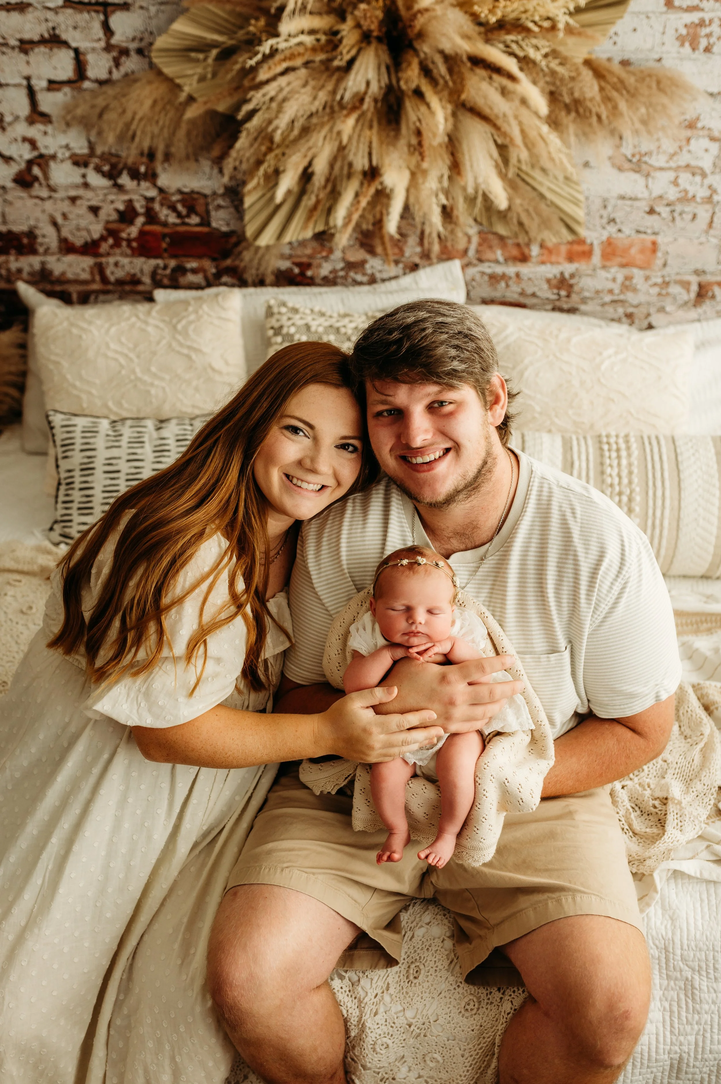 parent photos with their newborn baby in Clarksville, TN