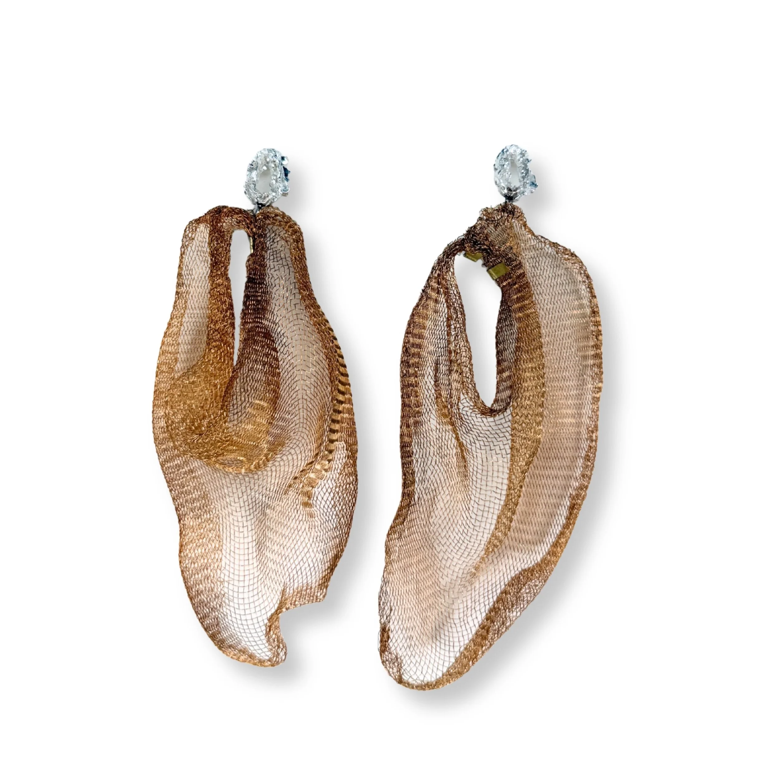 Drape
Bronze mesh screen, sterling silver, brass.

Inspired by the heirloom veil I inherrited, I&rsquo;ve spent the summer making a series of earrings to mimic the movement of this veil, by using traditional sewing techniques like draping, ruching, a