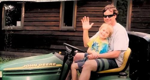 Founder, Casey Adams, mowing at a young age with his father.