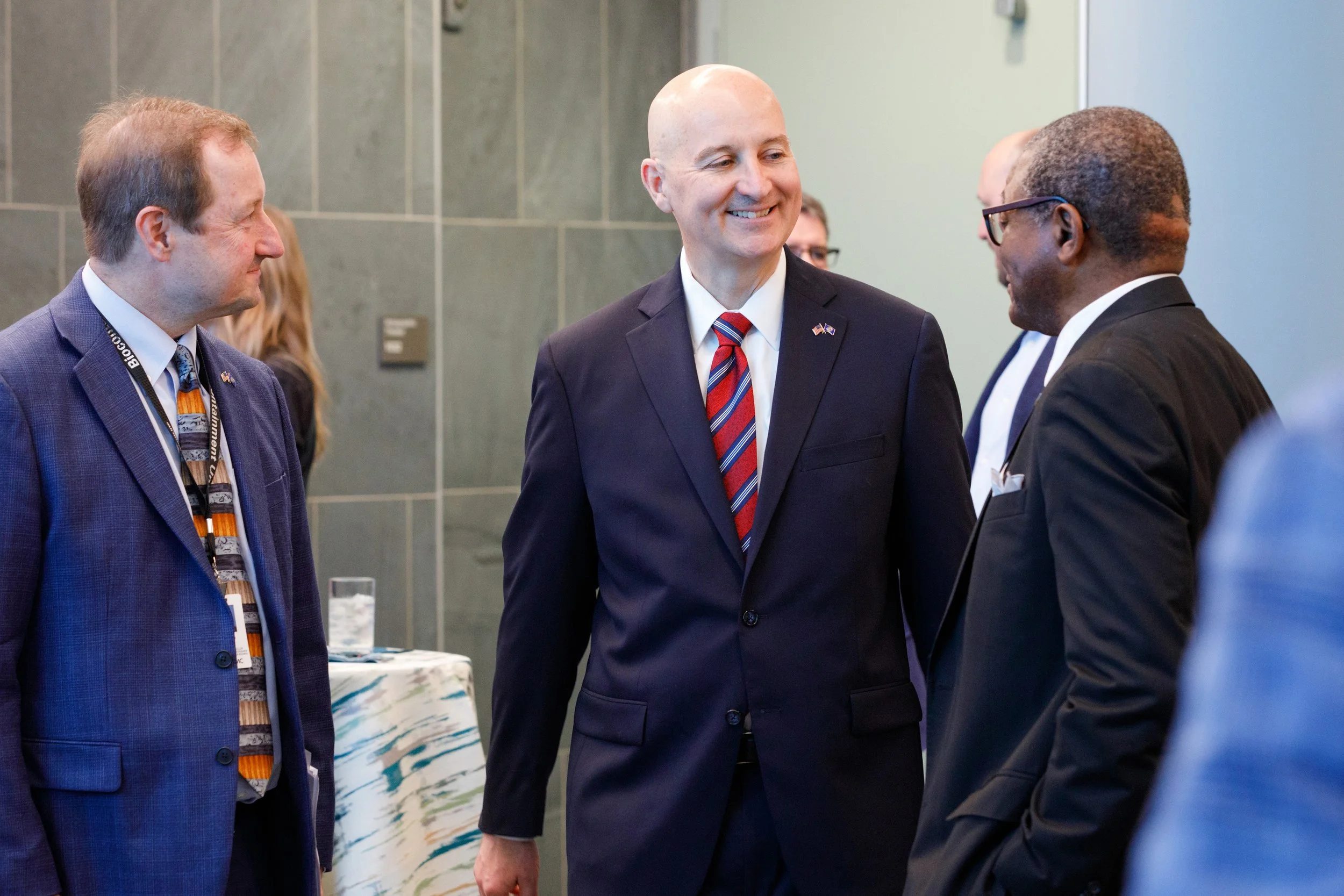 Dr. Dele Davies talks to Senator Pete Rickets