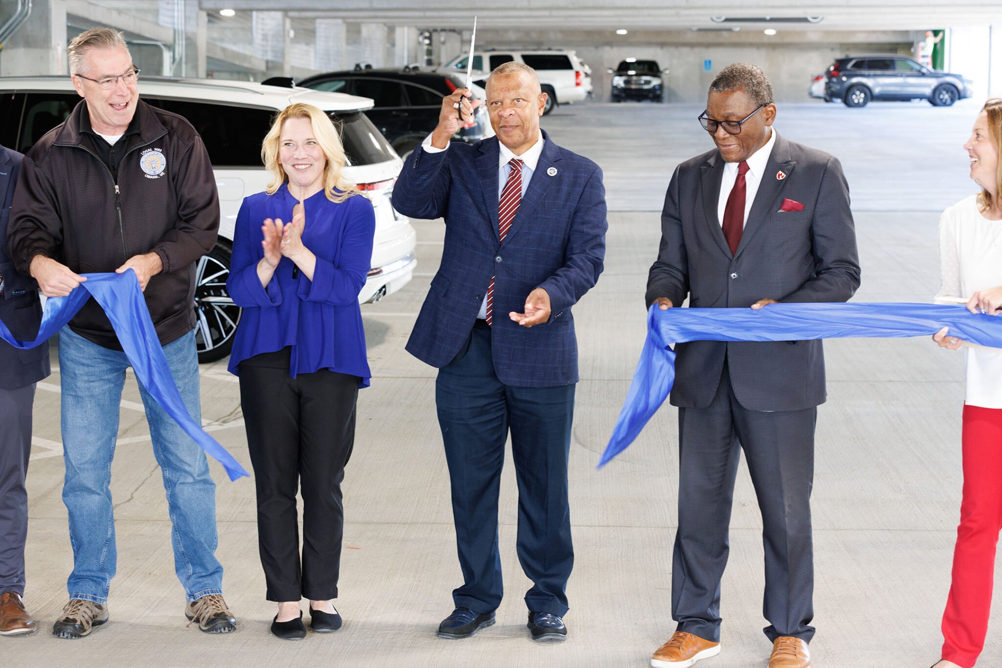 Dr. Davies and Omaha Mayor Ewing cut ribbon on parking garage
