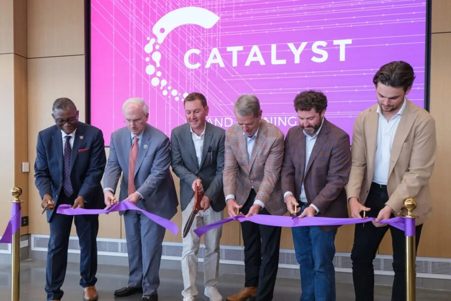Dr. Davies and leaders cut ribbon at Catalyst building opening