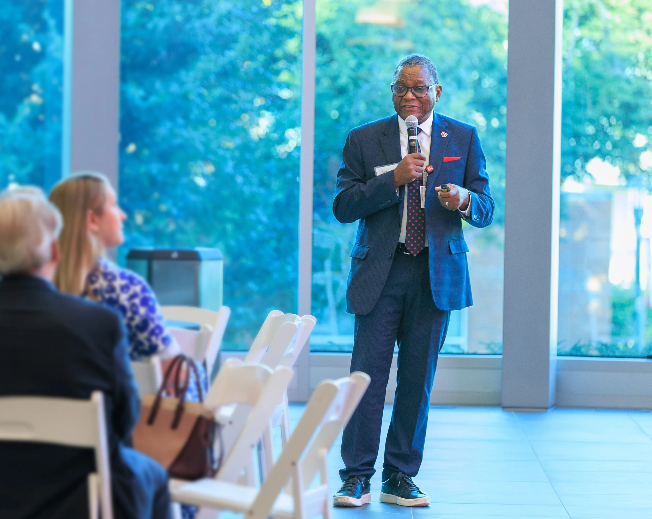 Dr. Dele Davies gives talk in front of people