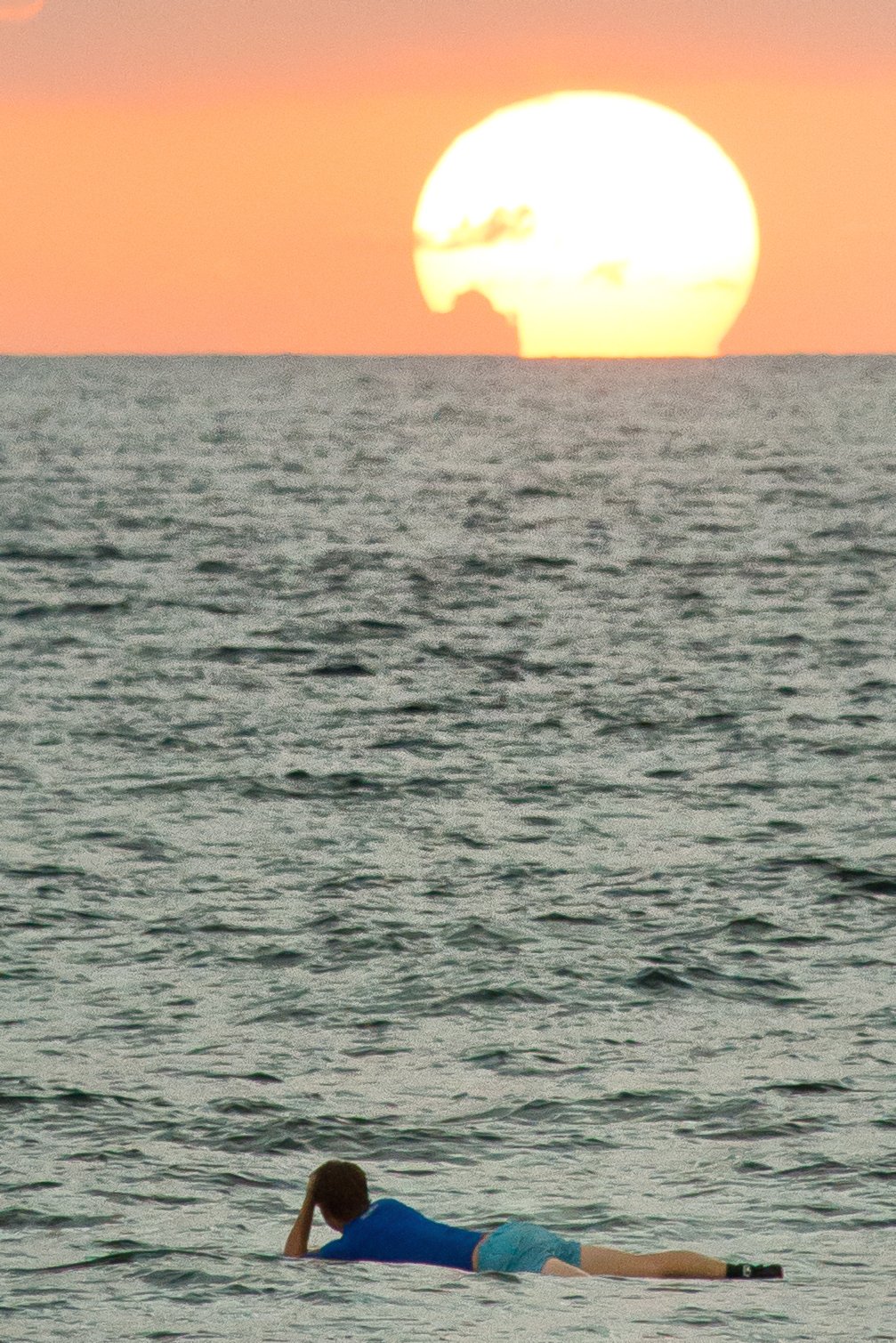 Sunset on a surfboard